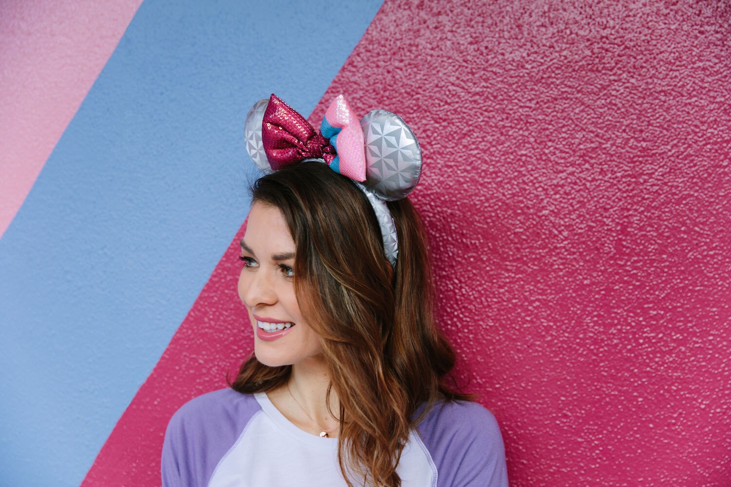 Model wearing Epcot bubblegum wall inspired Mickey ears 