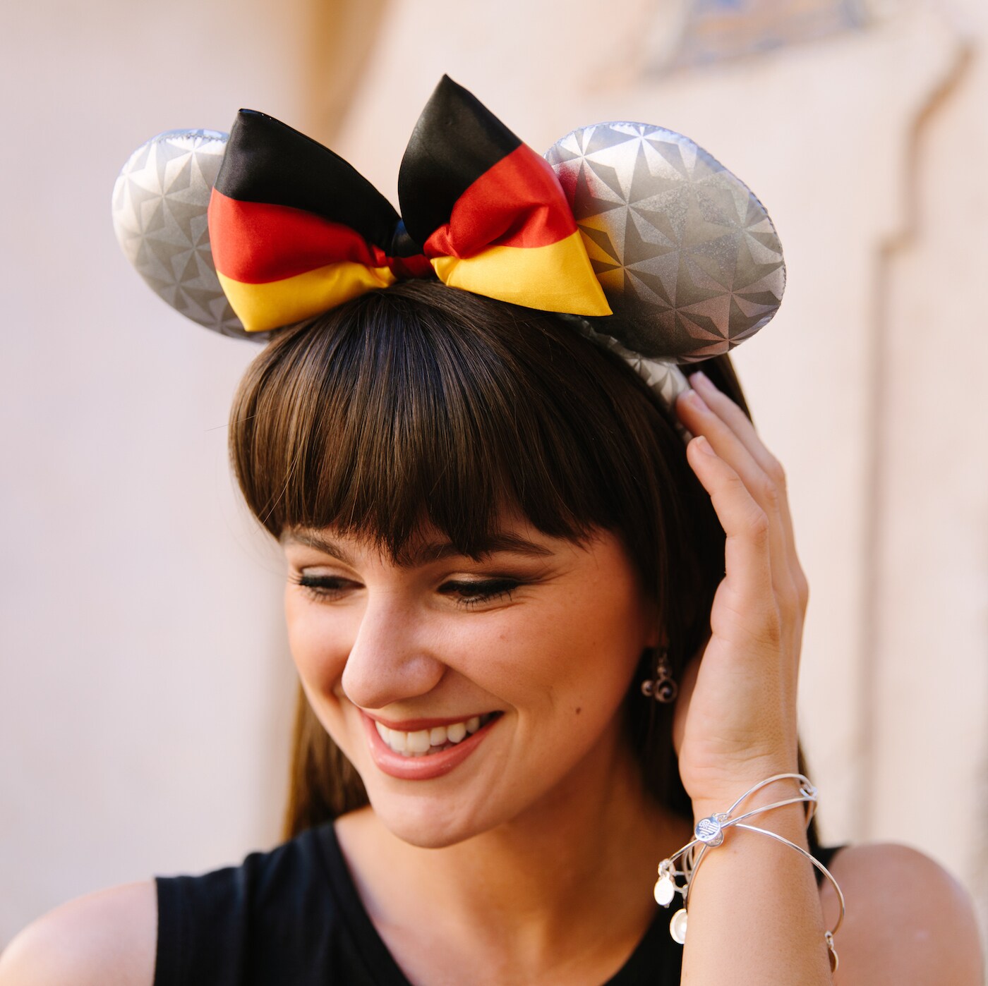 Model wearing Epcot's Earth-inspired Germany Mickey ears 