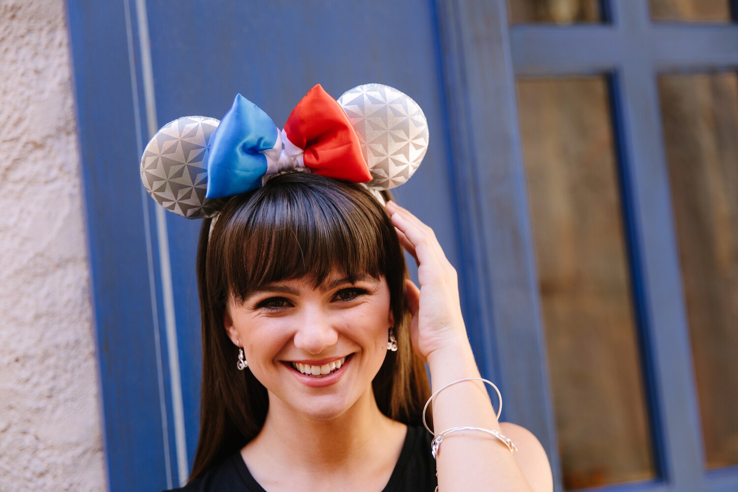 Model wearing Epcot's Earth-inspired France Mickey ears