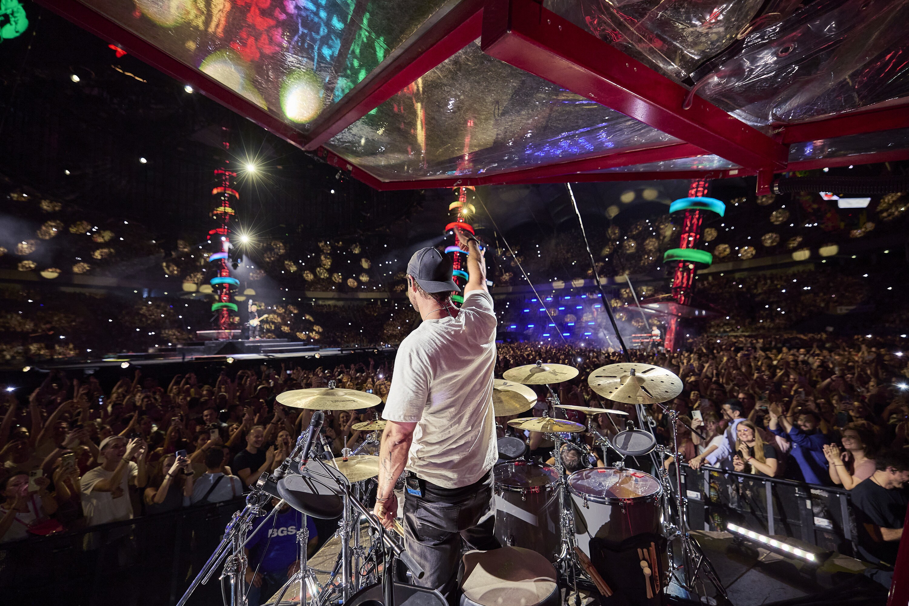 Chris Hemsworth drums during the Ed Sheeran concert in Bucharest. (credit: NationalGeographic/Evan Paterakis)