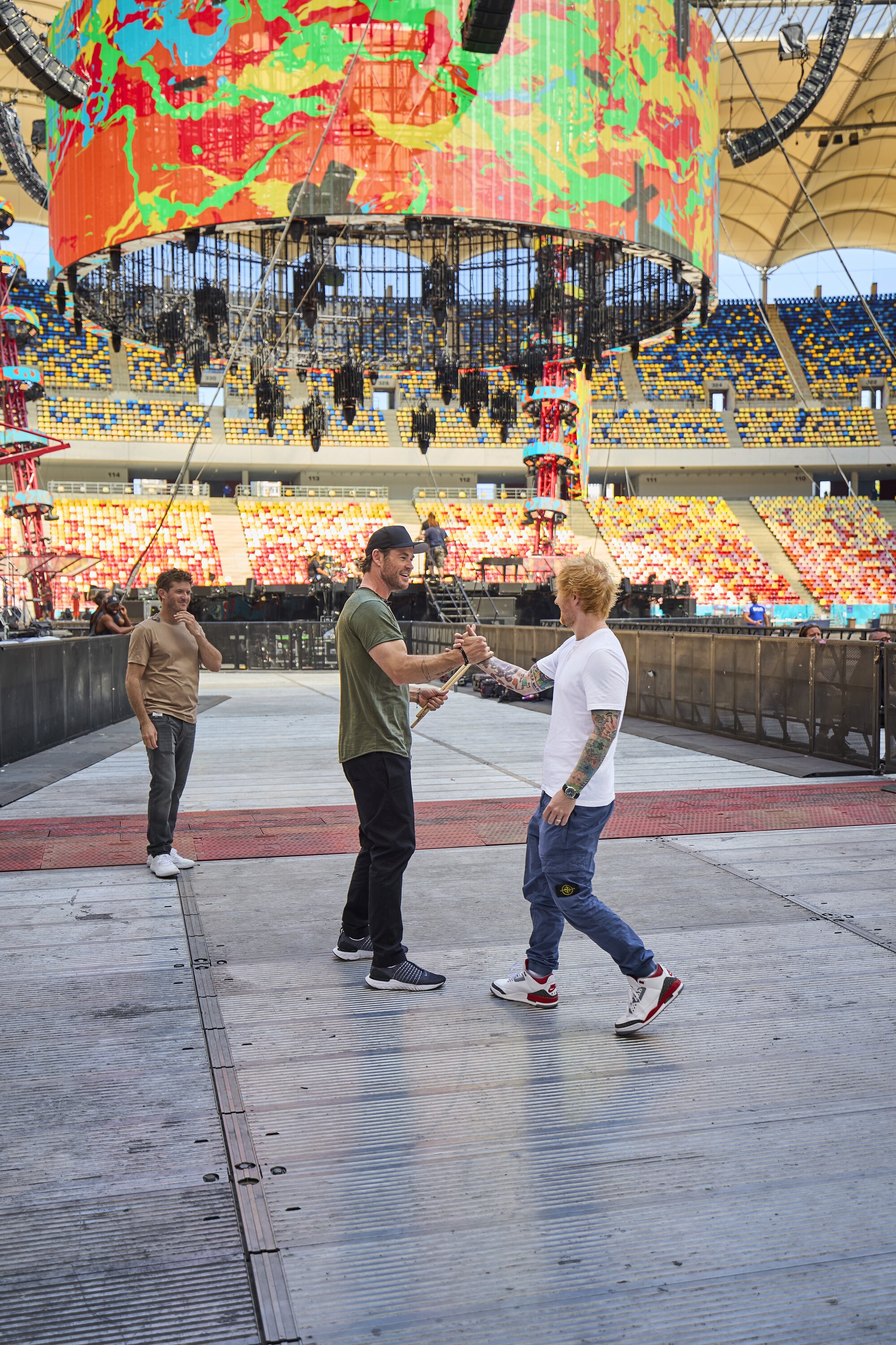 Inspired by the benefits of learning a new skill, which aids memory and cognitive function, Chris Hemsworth takes up drumming. When Ed Sheeran invites him to perform at a stadium concert, Chris has just months to master the instrument, conquer his nerves, and perform in front of 70,000 fans. It's a challenge that pushes him beyond his limits.  Chris, center, and Ed, right, meet before the concert with Chris' drum coach Ben Gordon (of rock band Parkway Drive), left. (credit: National Geographic/Evan Paterakis)