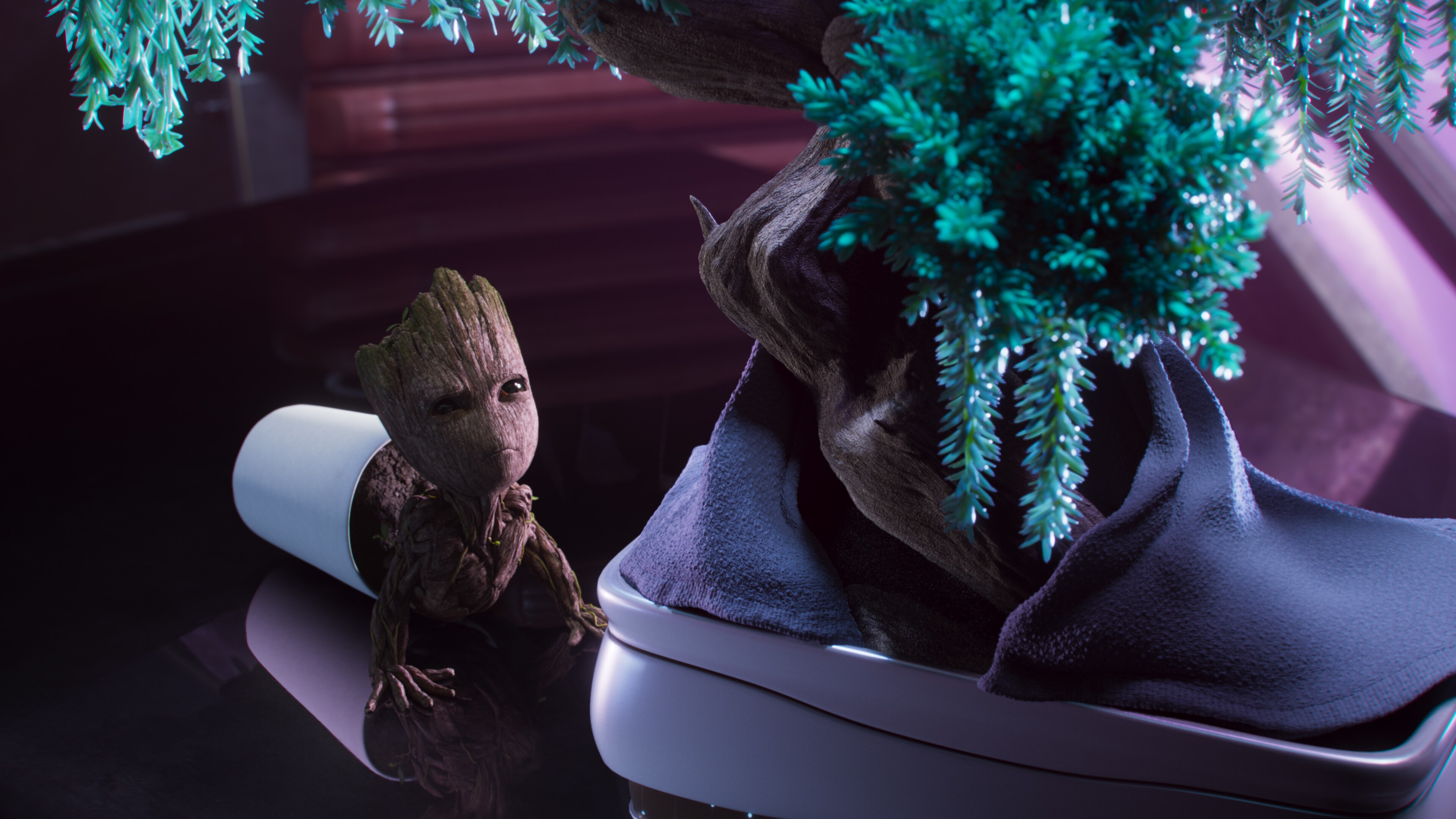 Groot looking angrily at a tree.