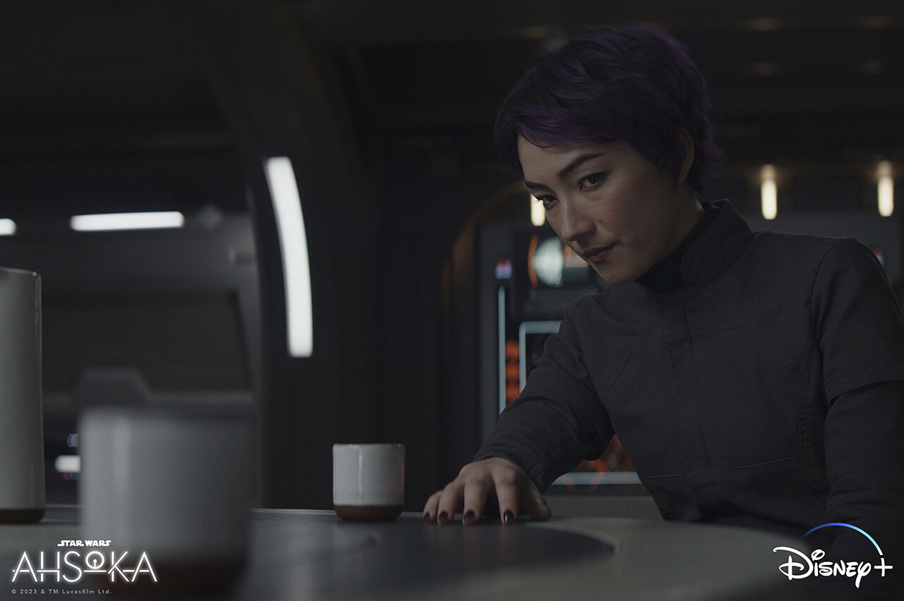 Sabine looks at a cup