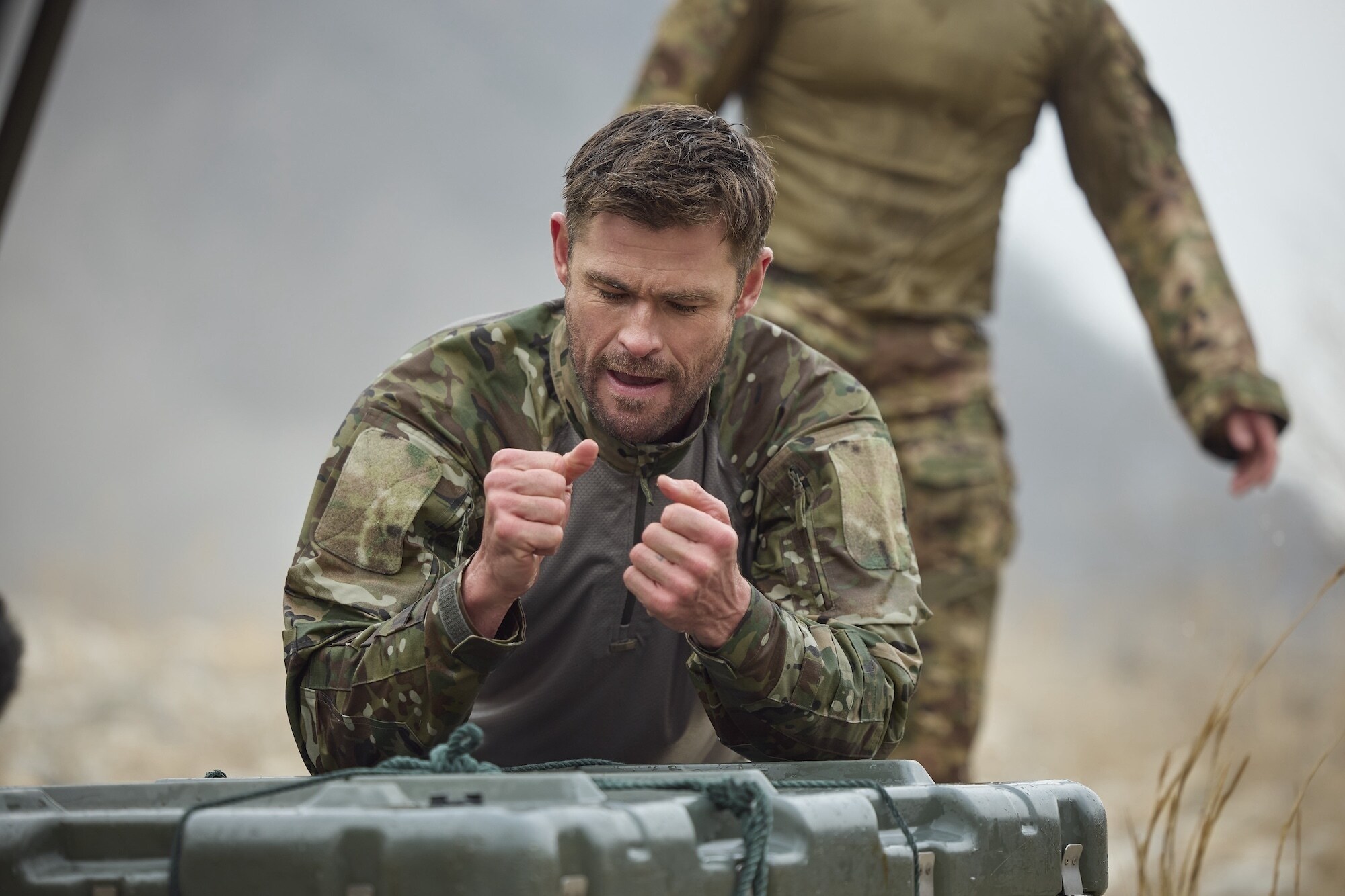 Chris Hemsworth sets out to confront his chronic pain in a bold, immersive journey through South Korea. Guided by pain expert Dr. BJ Miller, he explores ancient healing traditions and cutting-edge science. The final test: "pain valley"—a brutal gauntlet of Special Forces trials that will push him to the limit. (credit: National Geographic/Evan Paterakis)