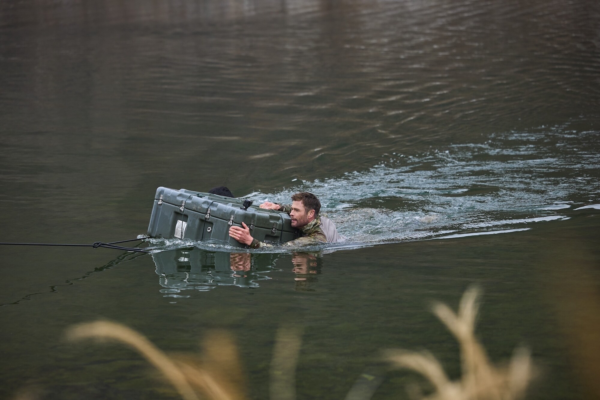 Chris Hemsworth sets out to confront his chronic pain in a bold, immersive journey through South Korea. Guided by pain expert Dr. BJ Miller, he explores ancient healing traditions and cutting-edge science. The final test: "pain valley"—a brutal gauntlet of Special Forces trials that will push him to the limit. (credit: National Geographic/Evan Paterakis)