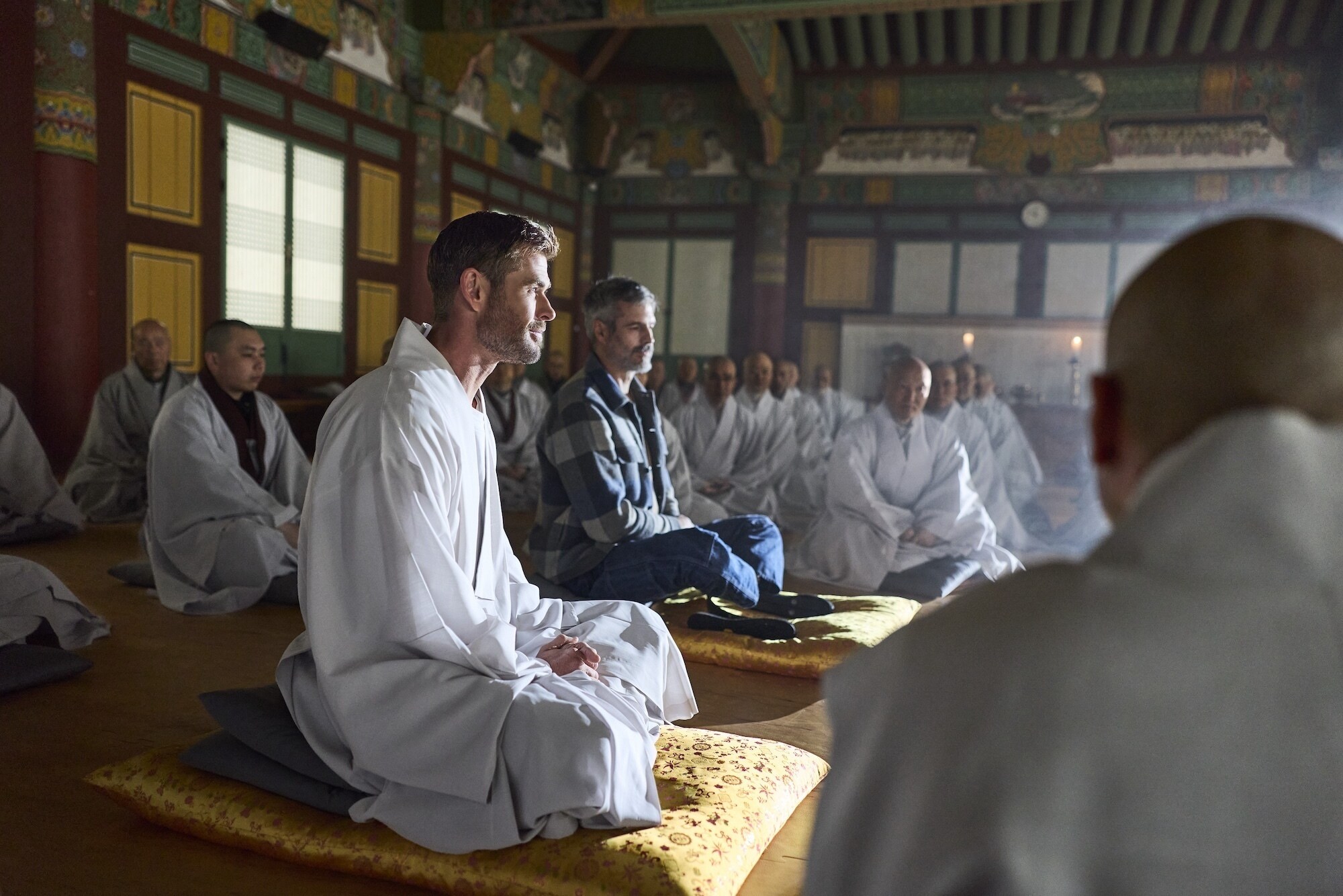 Chris Hemsworth sets out to confront his chronic pain in a bold, immersive journey through South Korea.  Chris visits the Beomeosa Temple in Busan, South Korea with pain expert Dr. B.J. Miller.(credit: National Geographic/Evan Paterakis)