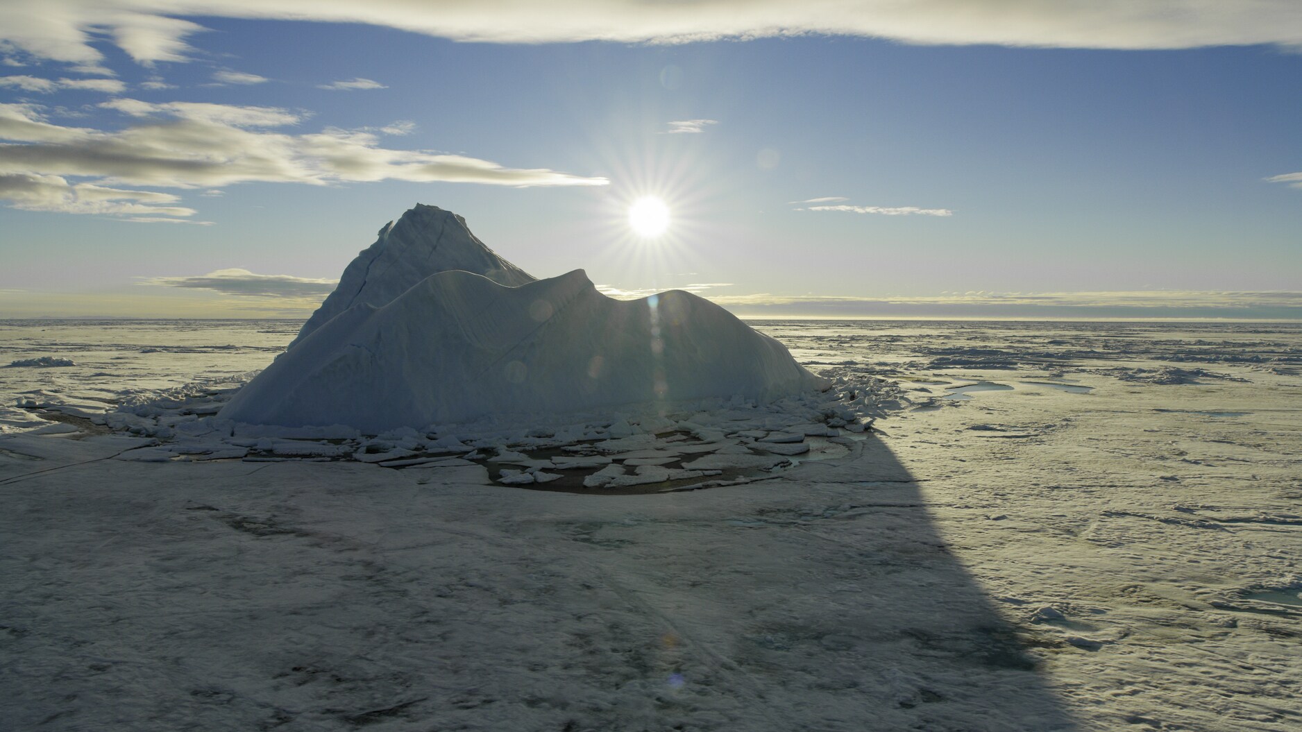 The sun sits just above the horizon in the arctic for 24 hours each summer. (National Geographic for Disney+/Thomas Miller)