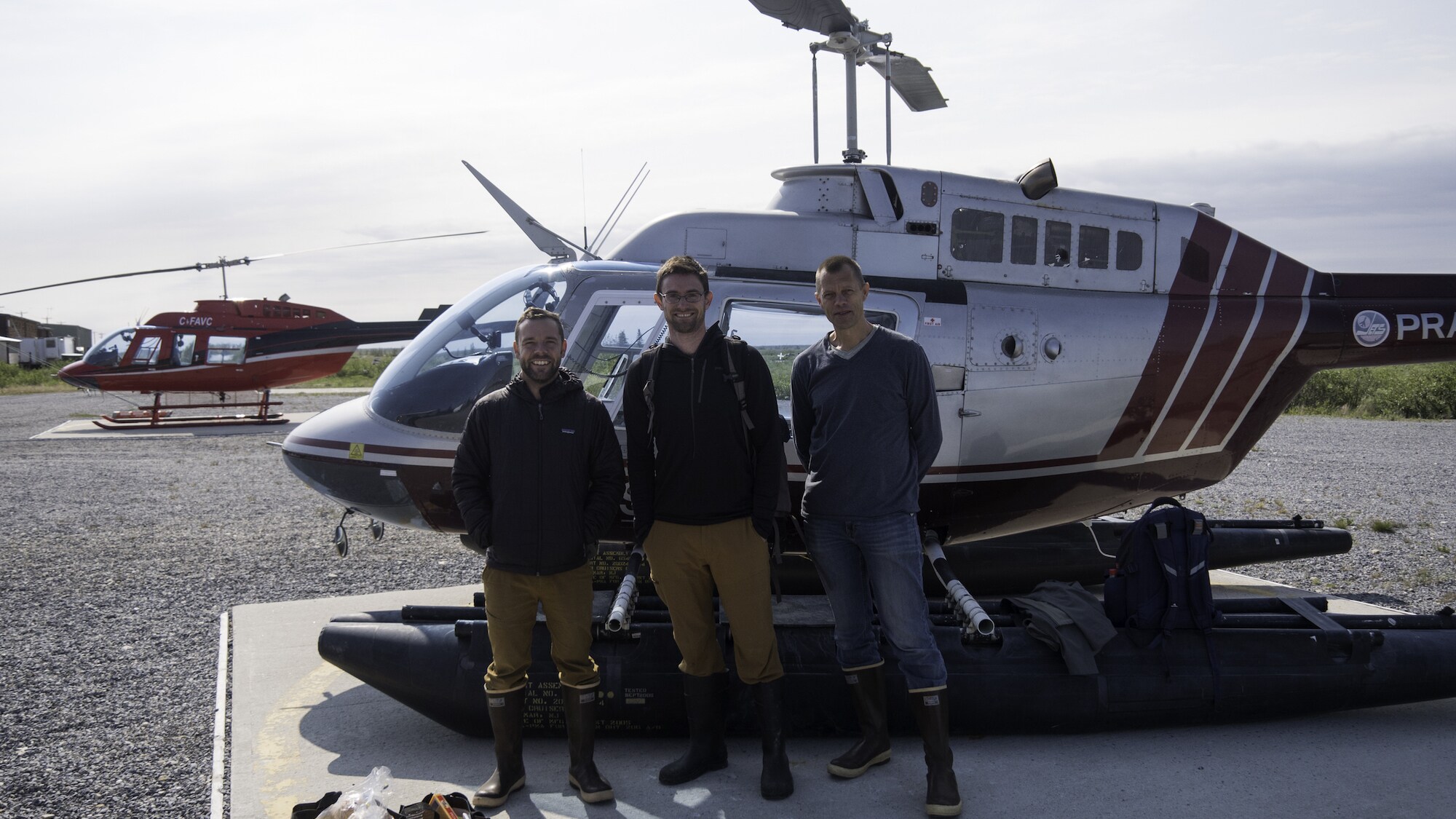 From left to right: Directors of Photography Hayes Baxley, Owen Bissell, and Peter Kragh prepare to film belugas in remote West Hudson Bay. (National Geographic for Disney+/Hayes Baxley)