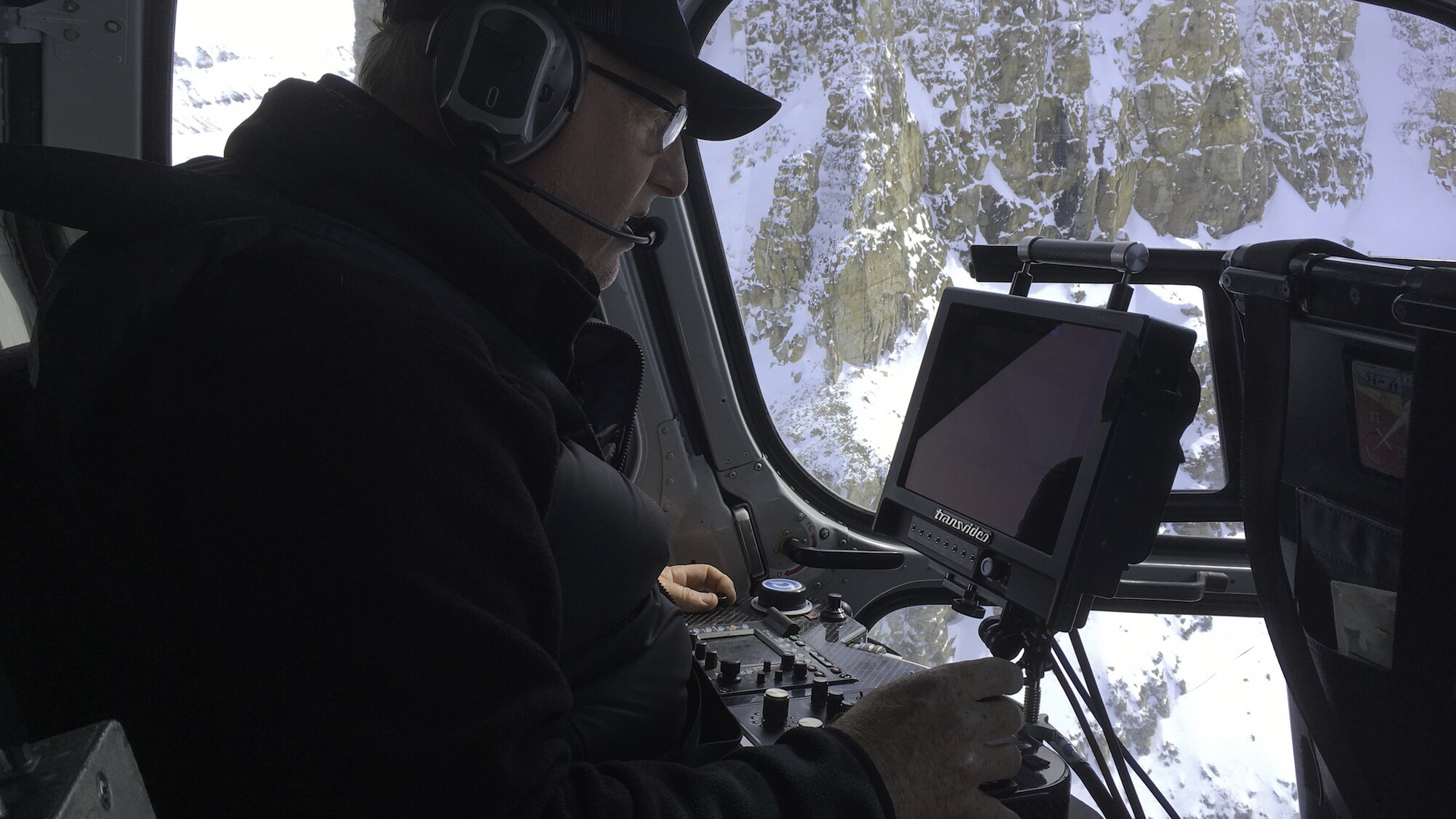 Aerial cinematographer Thomas Miller films elusive Arctic whales with a specialty camera stabilizer called a Cineflex. (National Geographic for Disney+/Thomas Miller)