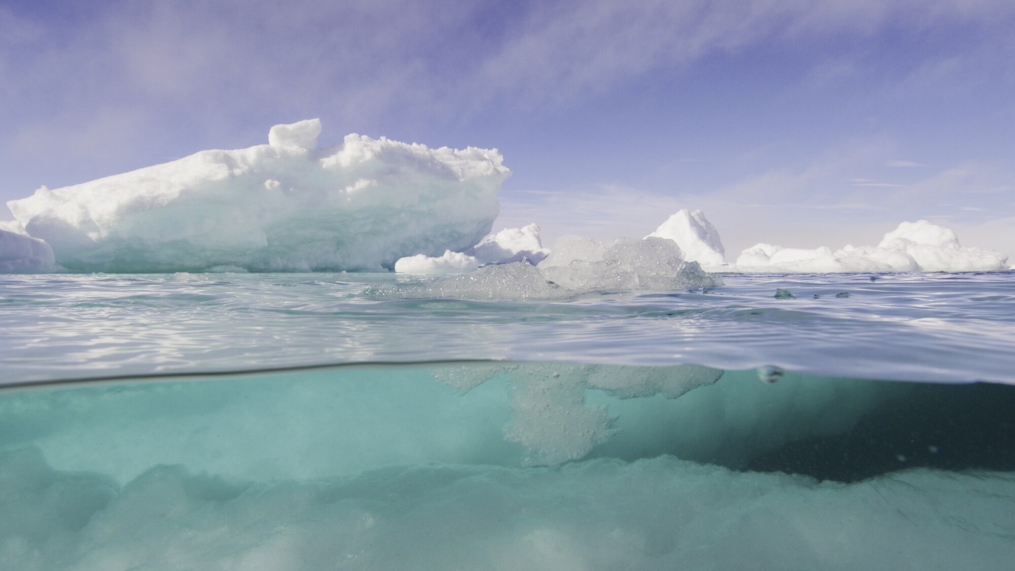 Summer transforms the Arctic landscape. The ice is constantly breaking, colliding, and contracting under the strength of a 24-hour sun. (National Geographic for Disney+/Ernie Kovacs)