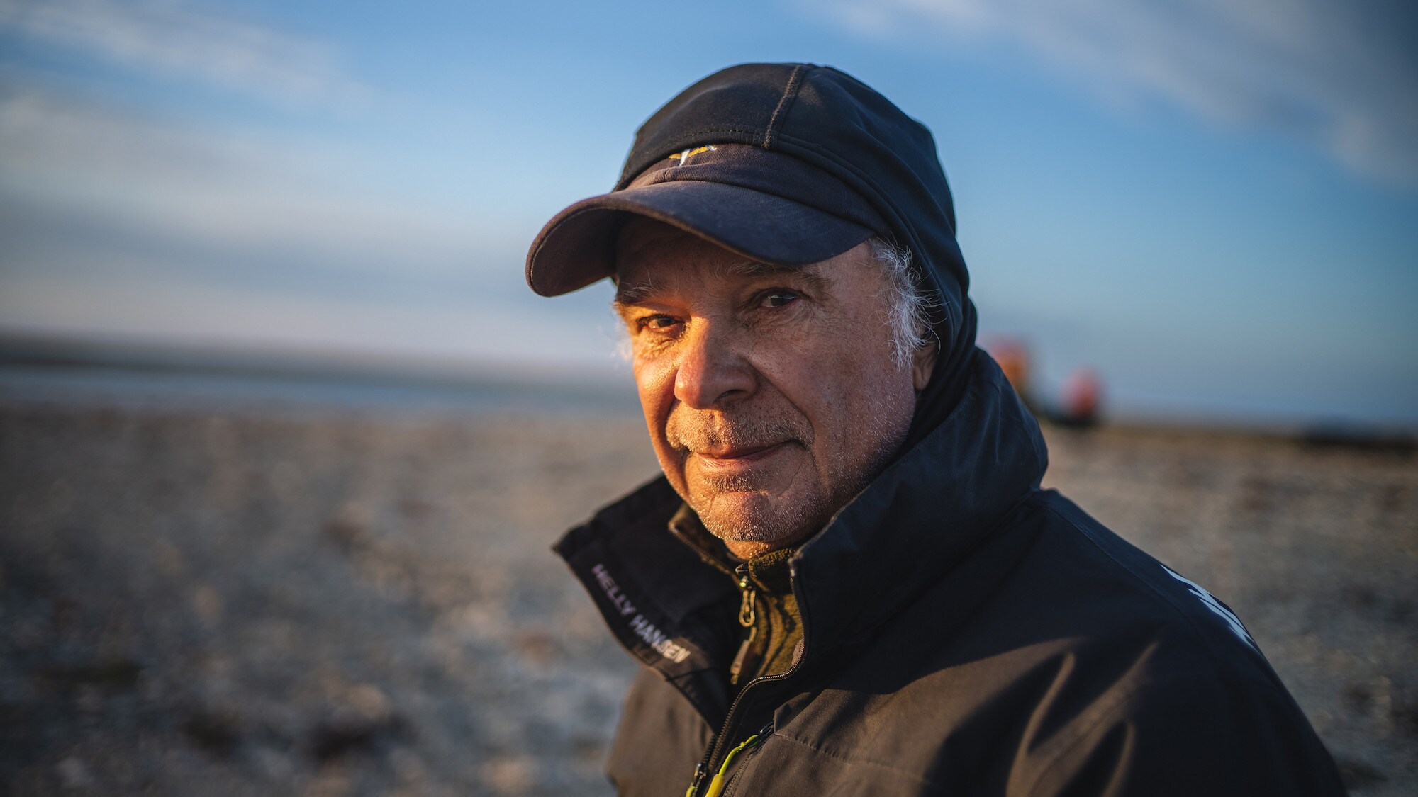 Franklin historian Tom Gross looks on at sunset on King William Island, Nunavut, Canada. He is part of a team searching for Sir John Franklin's lost tomb on King William Island, Nunavut, Canada. (National Geographic/Renan Ozturk)