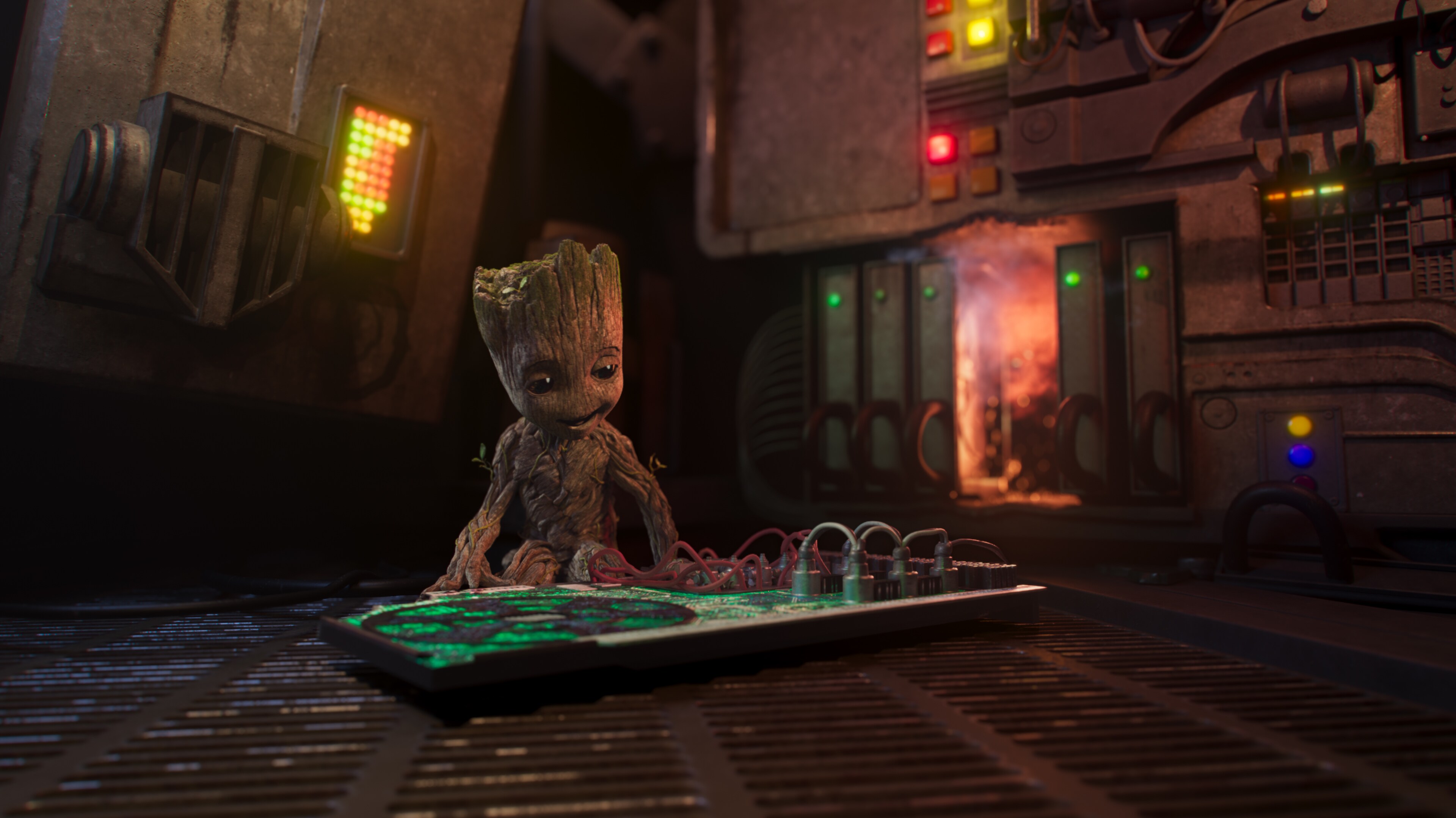 Groot admiring a circuit board.
