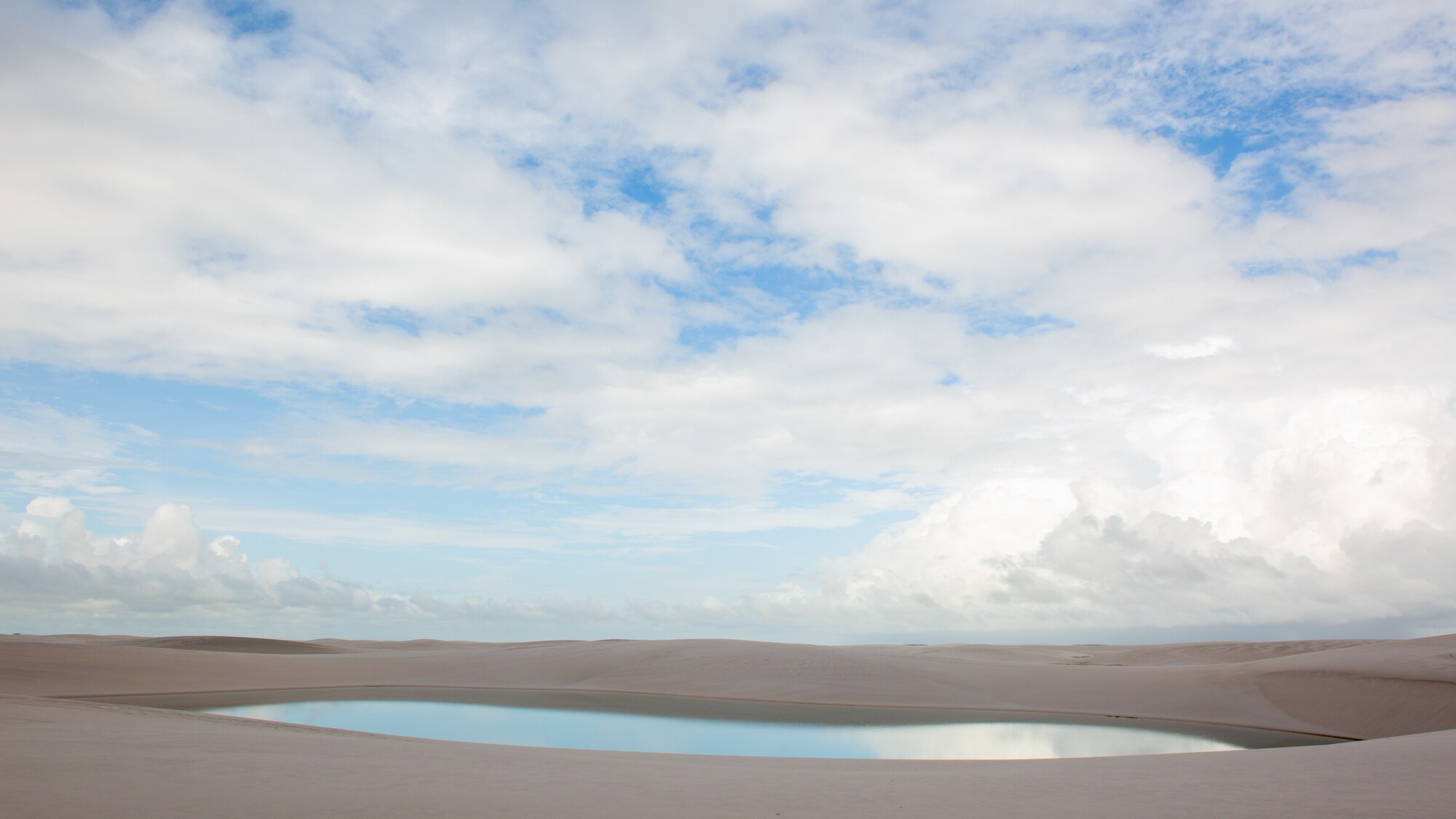 Lagoons in sand dunes. (National Geographic for Disney+/Jody Bourton)