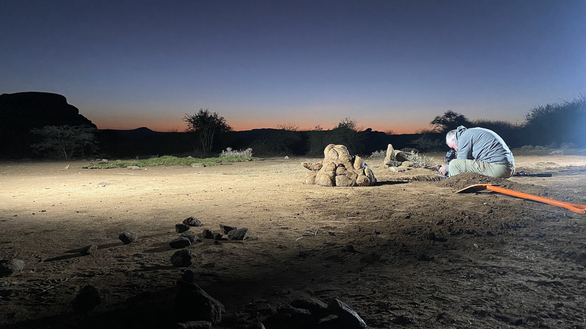 Director of Photography Chris Openshaw films a mini "Pride Rock" at dusk at the Mpala Research Centre, Nanyuki, Laikipia, Kenya for the "Land of Giants" episode of "A Real Bug's Life." (National Geographic/Amy Gilchrist)