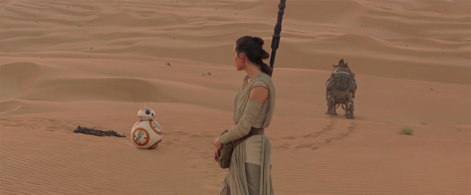 A droid -- BB-8 -- has been captured! Rey admonishes Teeto and frees the droid from his net. She ...