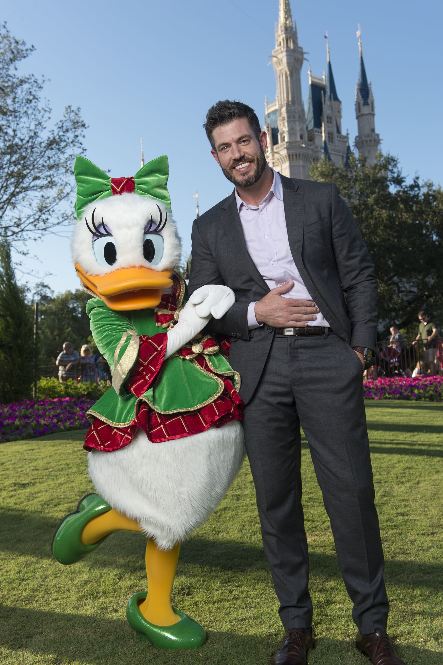 Jesse Palmer poses Nov. 13, 2015 with Daisy Duck during a break from taping the 'Disney Parks Unf...