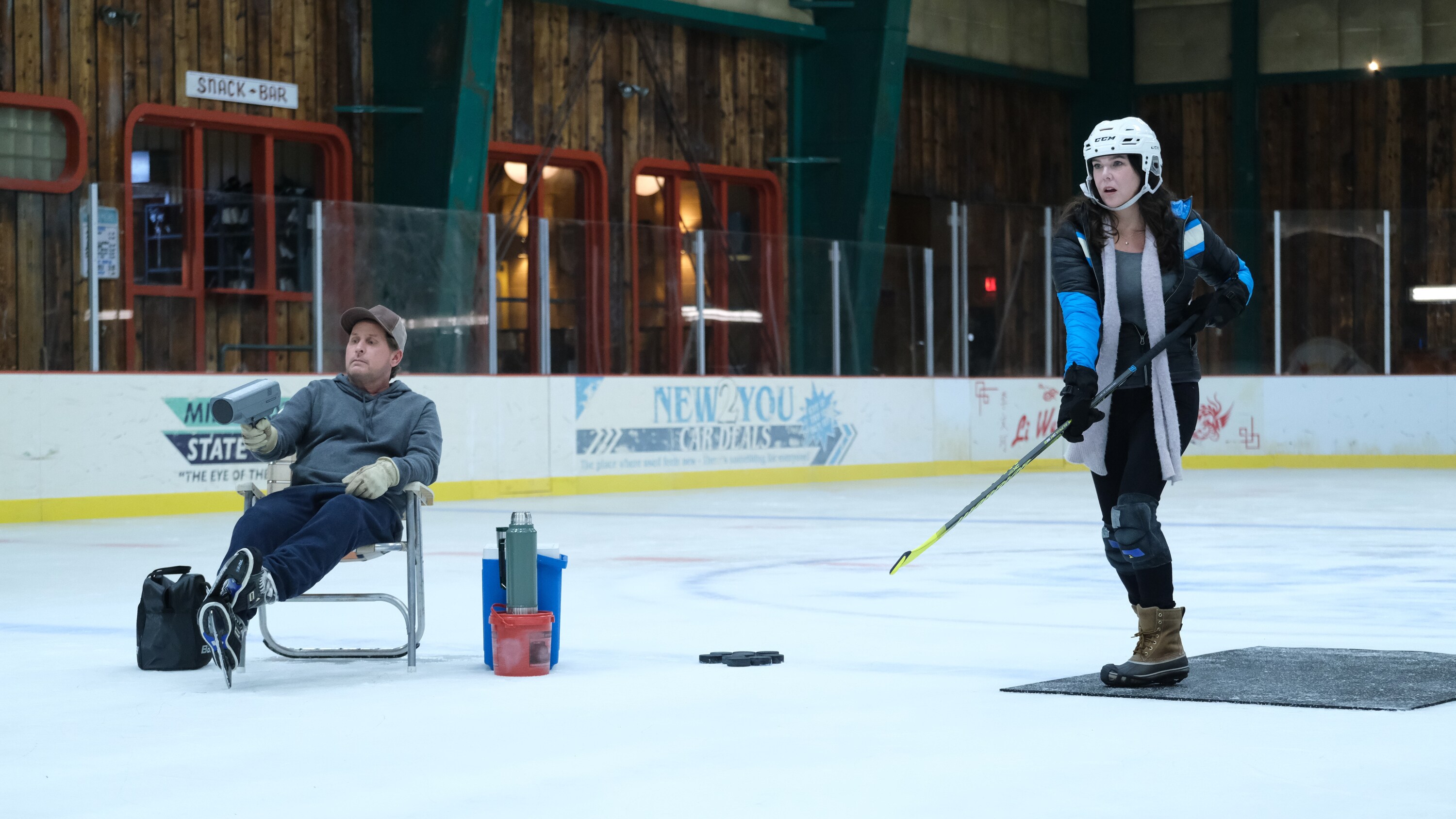 THE MIGHTY DUCKS: GAME CHANGERS - "Hockey Moms" - Bombay helps the Don’t Bother moms take on Duck moms on the ice; Sofi’s fate hangs in the balance. (Disney/Liane Hentscher) EMILIO ESTEVEZ, LAUREN GRAHAM