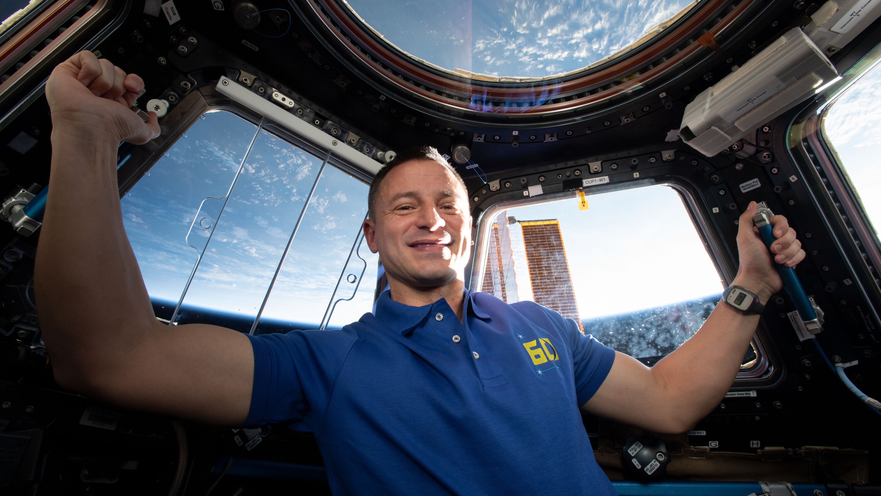 AMONG THE STARS - (July 23, 2019) - Expedition 60 Flight Engineer Drew Morgan of NASA is pictured inside the International Space Station's "window to the world," the seven-windowed Cupola. At the time this photograph was taken, the orbiting lab was flying 261 miles above the Caspian Sea. (NASA) DREW MORGAN