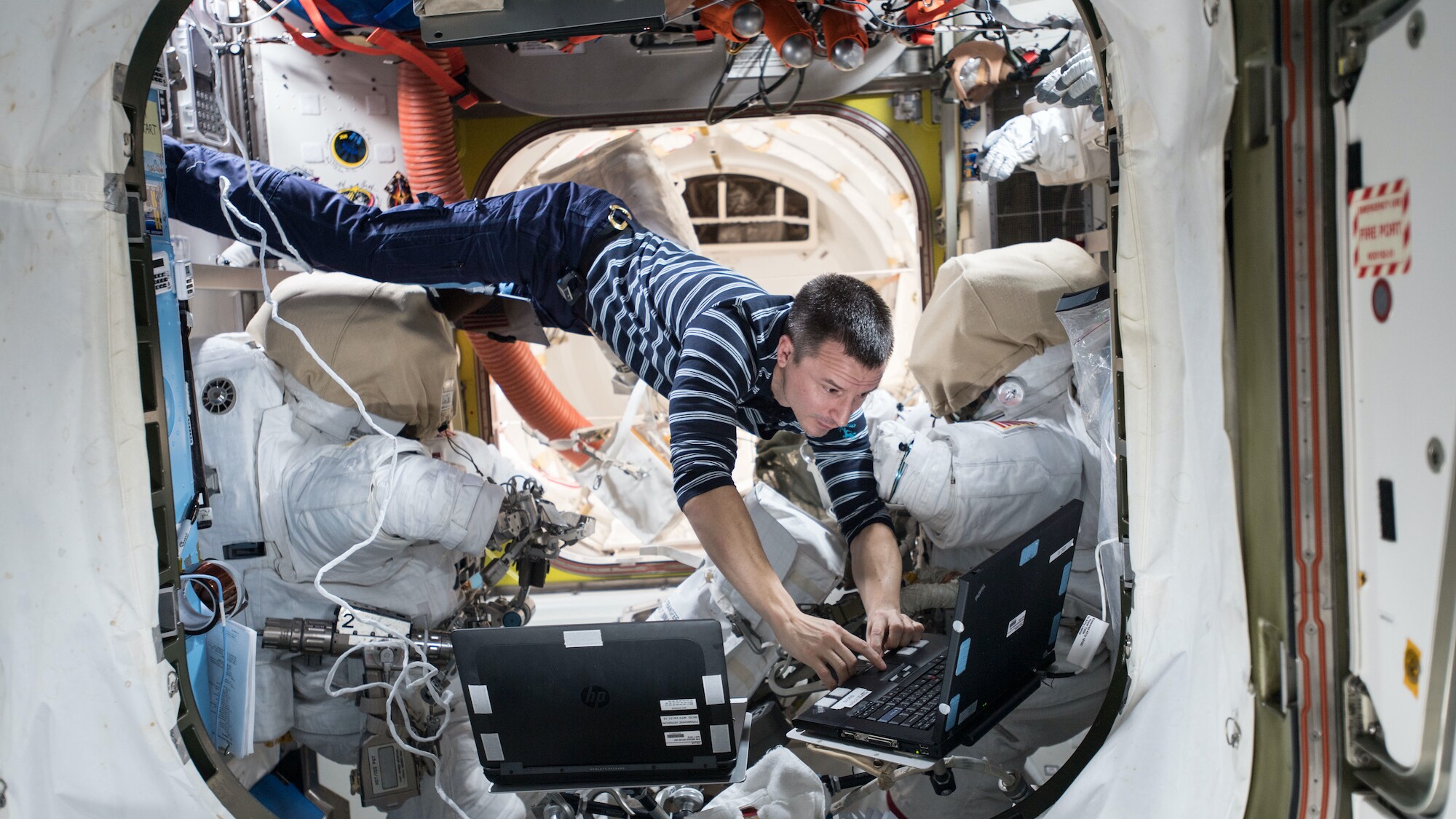 AMONG THE STARS - NASA astronaut Andrew Morgan reviews procedures the day before the EVA that took place on Oct. 6 to upgrade the space station’s batteries. (NASA) ANDREW MORGAN