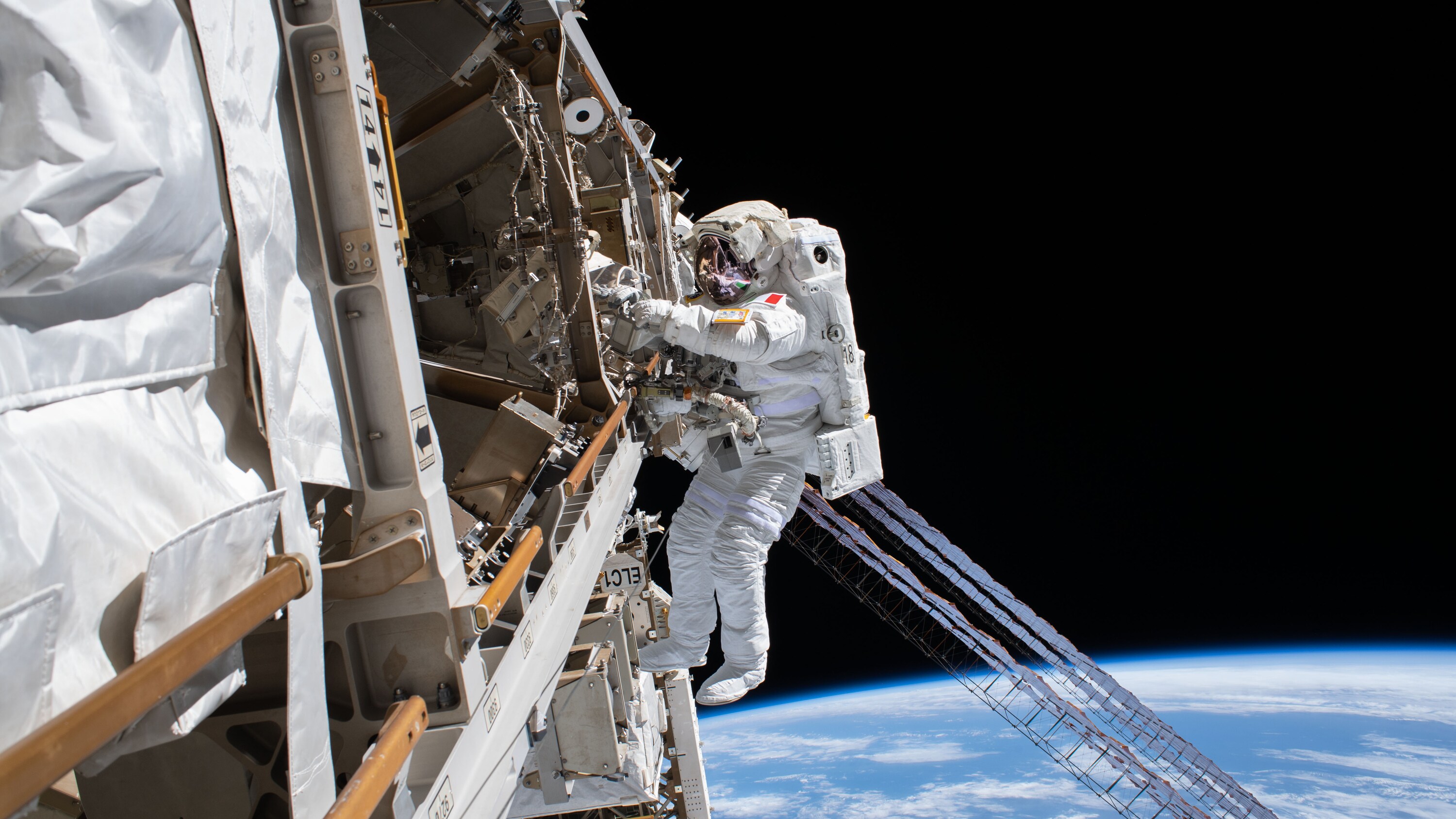 AMONG THE STARS - (Jan. 25, 2020) - ESA (European Space Agency) astronaut Luca Parmitano is pictured tethered to the International Space Station while finalizing thermal repairs on the Alpha Magnetic Spectrometer, a dark matter and antimatter detector, during a spacewalk that lasted 6 hours and 16 minutes. (NASA) LUCA PARMITANO