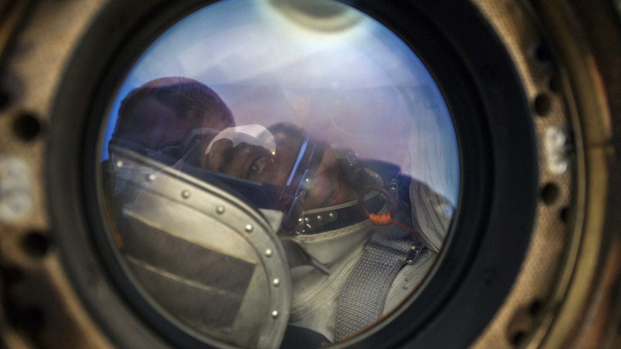 AMONG THE STARS - Expedition 63 NASA astronaut Chris Cassidy smiles from inside the Soyuz MS-16 spacecraft just minutes after he and Roscosmos cosmonauts Ivan Vagner, and Anatoly Ivanishin, landed in a remote area near the town of Zhezkazgan, Kazakhstan on Thursday, October 22, 2020, Kazakh time (Oct. 21 Eastern time). Cassidy, Ivanishin and Vagner returned after 196 days in space having served as Expedition 62-63 crew members onboard the International Space Station. (NASA/GCTC/Denis Derevtsov) CHRIS CASSIDY