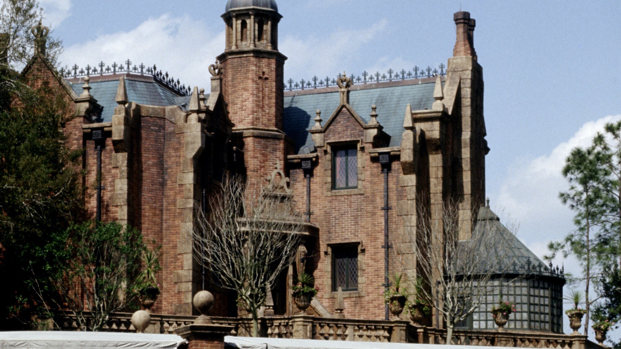 Image of the Haunted Mansion exterior during the day.