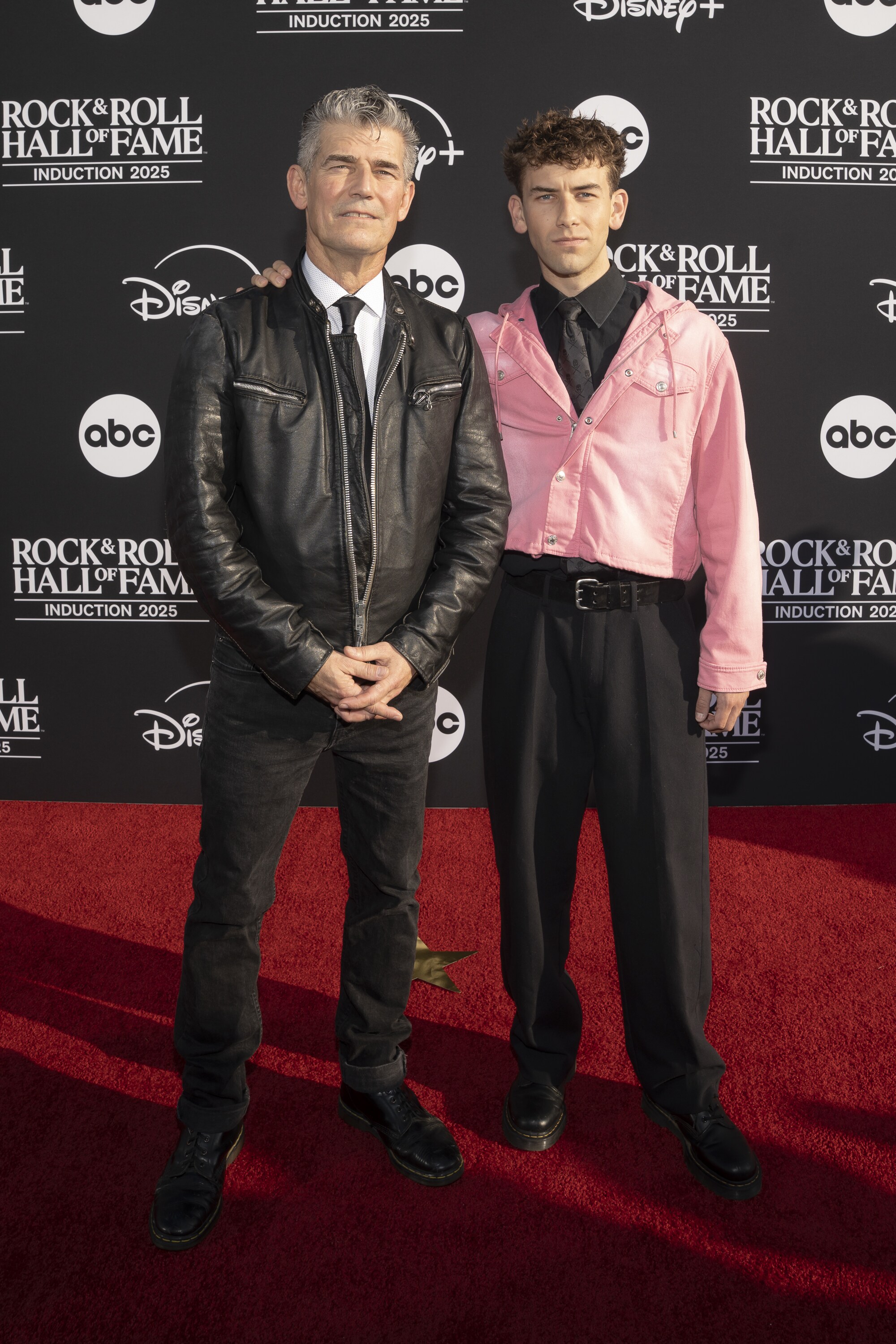 ROCK & ROLL HALL OF FAME 2025 INDUCTION CEREMONY – The 2025 Rock & Roll Hall of Fame Induction Ceremony, with once-in-a-lifetime performances and collaborations paying tribute to the iconic, generation-defining inductees, will be broadcast live coast to coast from Los Angeles on SATURDAY, NOV. 8 (8:00 p.m. EDT) on Disney+. (Disney/Cristian Lopez)  GREG HARRIS (PRESIDENT, ROCK AND ROLL HALL OF FAME), JACK HARRIS 