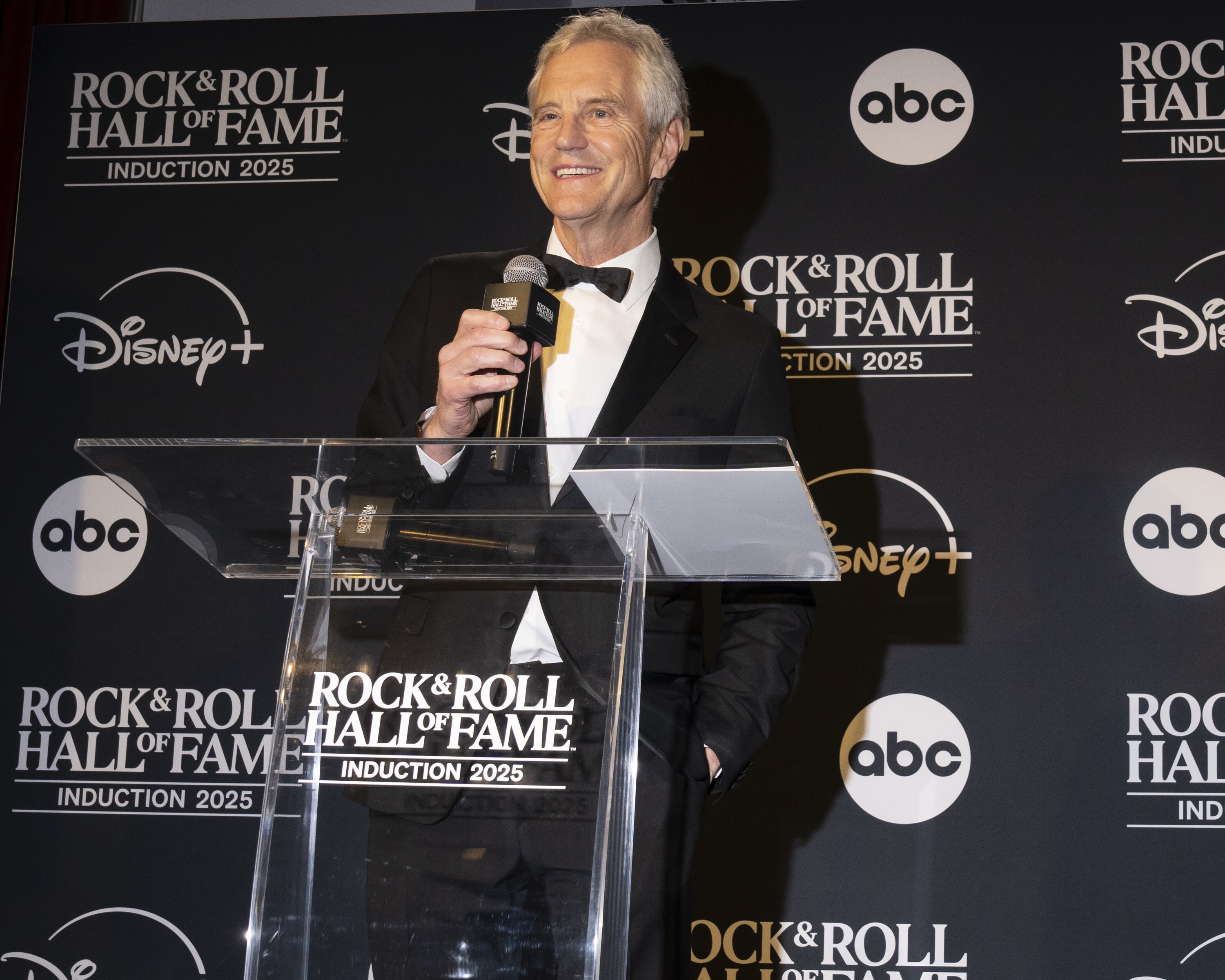 ROCK & ROLL HALL OF FAME 2025 INDUCTION CEREMONY – The 2025 Rock & Roll Hall of Fame Induction Ceremony, with once-in-a-lifetime performances and collaborations paying tribute to the iconic, generation-defining inductees, will be broadcast live coast to coast from Los Angeles on SATURDAY, NOV. 8 (8:00 p.m. EDT) on Disney+. (Disney/Ser Baffo) JOHN SYKES (CHAIRMAN, ROCK & ROLL HALL OF FAME FOUNDATION) 