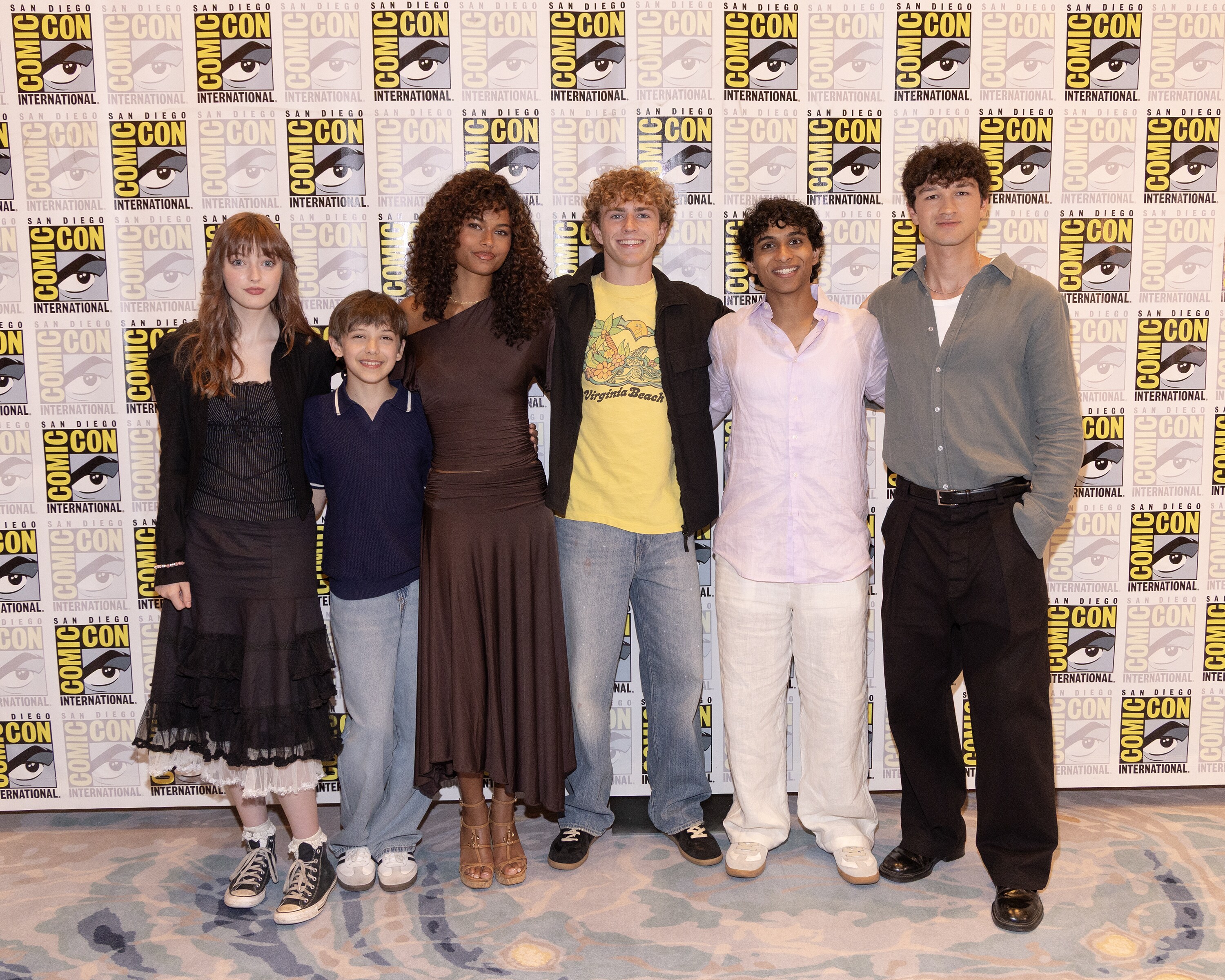 PERCY JACKSON AND THE OLYMPIANS - Series stars Walker Scobell, Aryan Simhadri, Charlie Bushnell, Tamara Smart, Levi Chrisopulos and Olive Abercrombie with Executive Producers Craig Silverstein and Dan Shotz at San Diego Comic-Con, in support of the epic Disney+ Original series “Percy Jackson and the Olympians” on Thursday, July 23, 2026. (Disney/Frank Micelotta)     OLIVE ABERCROMBIE, LEVI CHRISOPULOS, TAMARA SMART, WALKER SCOBELL, ARYAN SIMHADRI, CHARLIE BUSHNELL