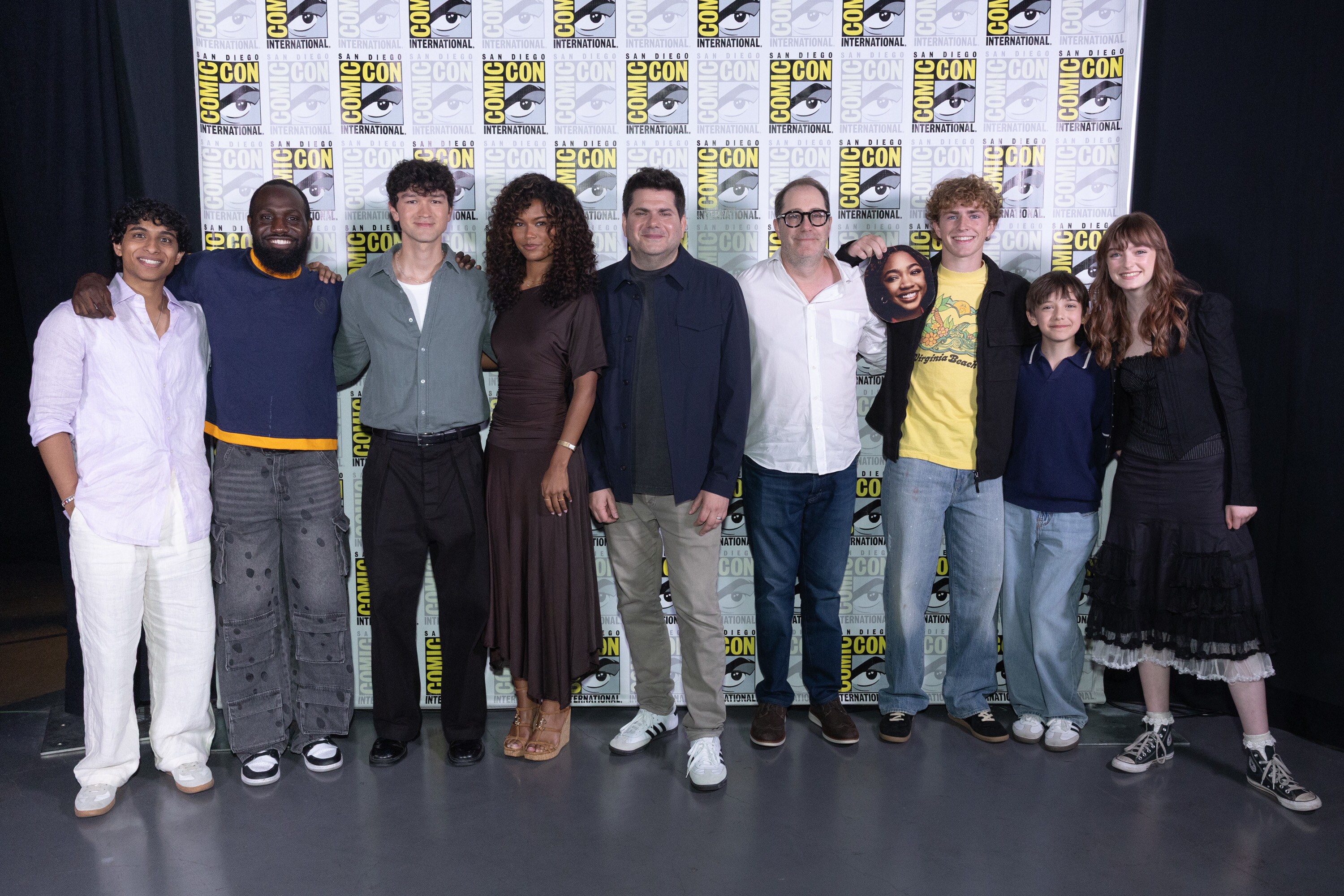 PERCY JACKSON AND THE OLYMPIANS - Series stars Walker Scobell, Aryan Simhadri, Charlie Bushnell, Tamara Smart, Levi Chrisopulos and Olive Abercrombie with Executive Producers Craig Silverstein and Dan Shotz share highlights from Season 3 of Disney+ Original series “Percy Jackson and the Olympians” during a Hall H panel, moderated by Juju Green on Thursday, July 23, 2026. (Disney/Stewart Cook)     ARYAN SIMHADRI, JUJU GREEN, CHARLIE BUSHNELL, TAMARA SMART, DAN SHOTZ, CRAIG SILVERSTEIN, WALKER SCOBELL, LEVI CHRISOPULOS, OLIVE ABERCROMBIE