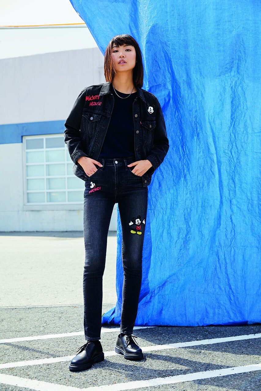 Levi Mickey Mouse themed black denim jacket and jeans
