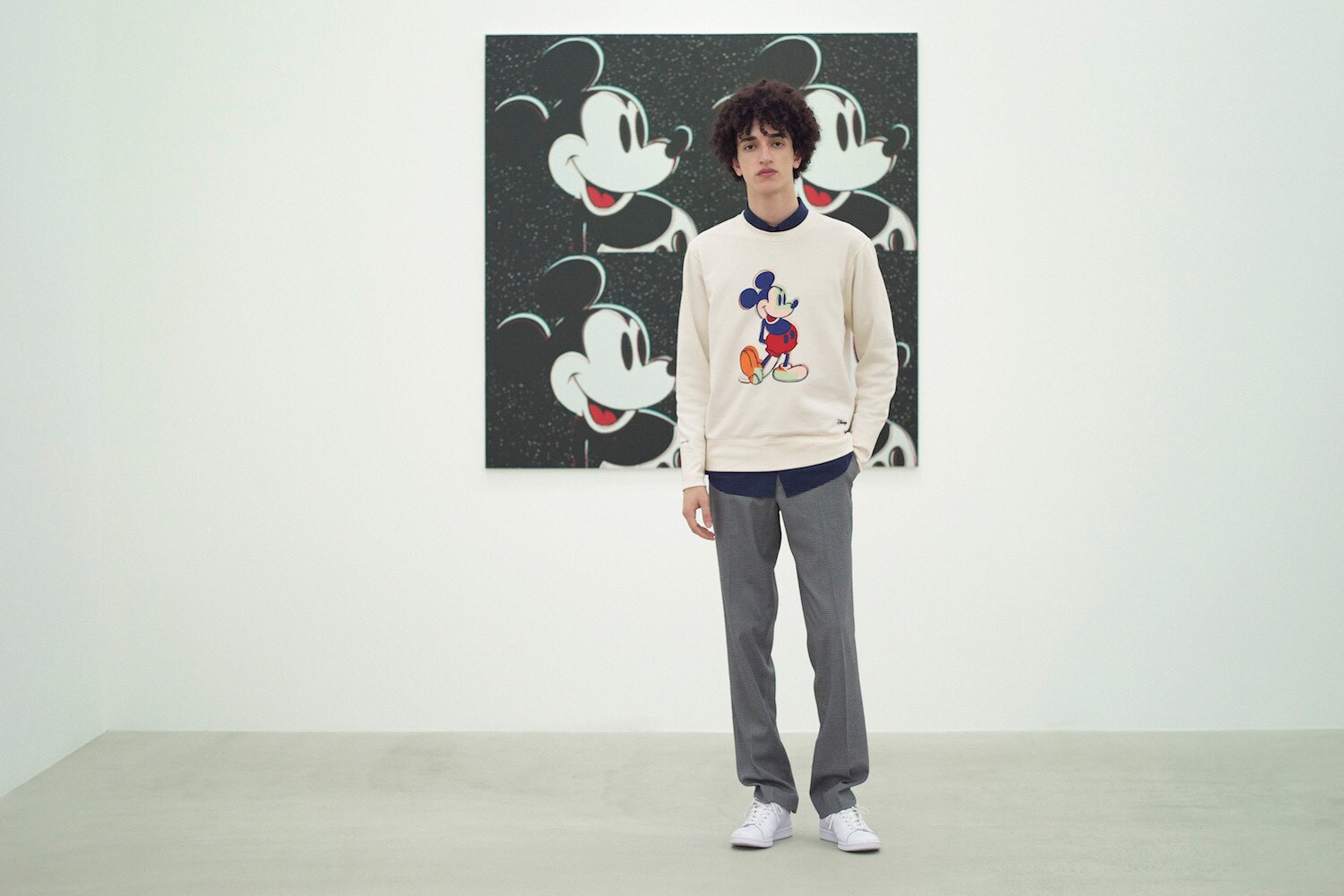 Model wearing a sweatshirt with Andy Warhol's pop art piece