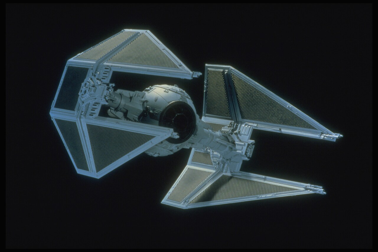 This episode marks the series debut of the TIE interceptor. Red markings denoting it as an elite ...