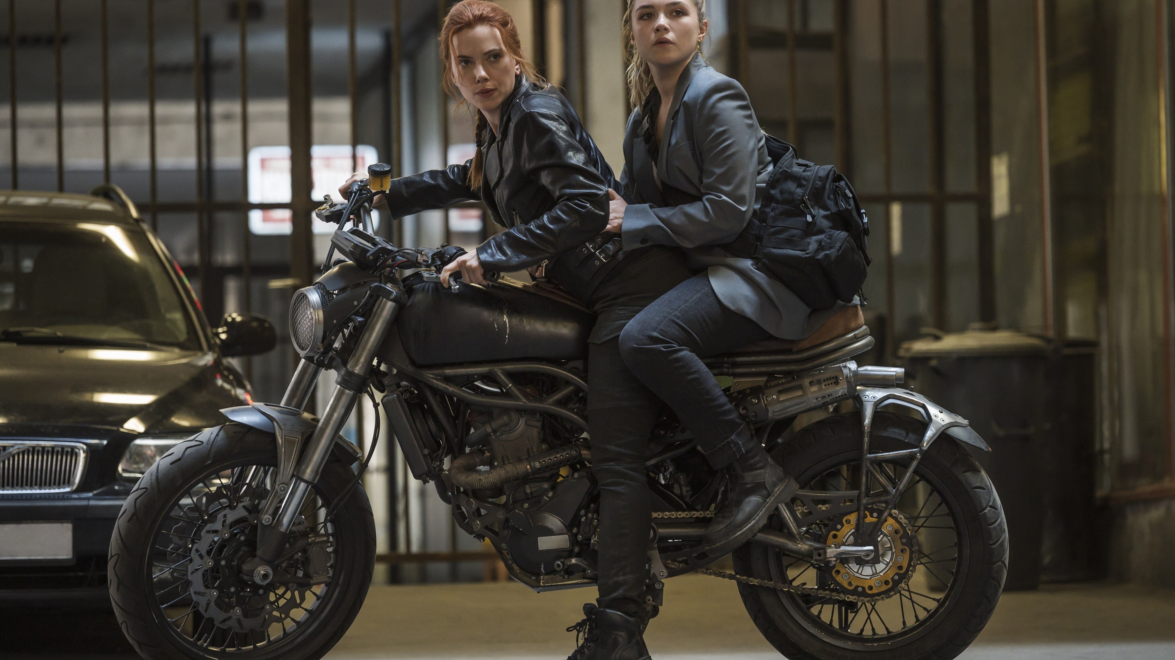 Scarlett Johansson as Black Widow/Natasha Romanoff and Florence Pugh as Yelena in Marvel Studios' BLACK WIDOW. Photo by Jay Maidment. ©Marvel Studios 2020. All Rights Reserved.