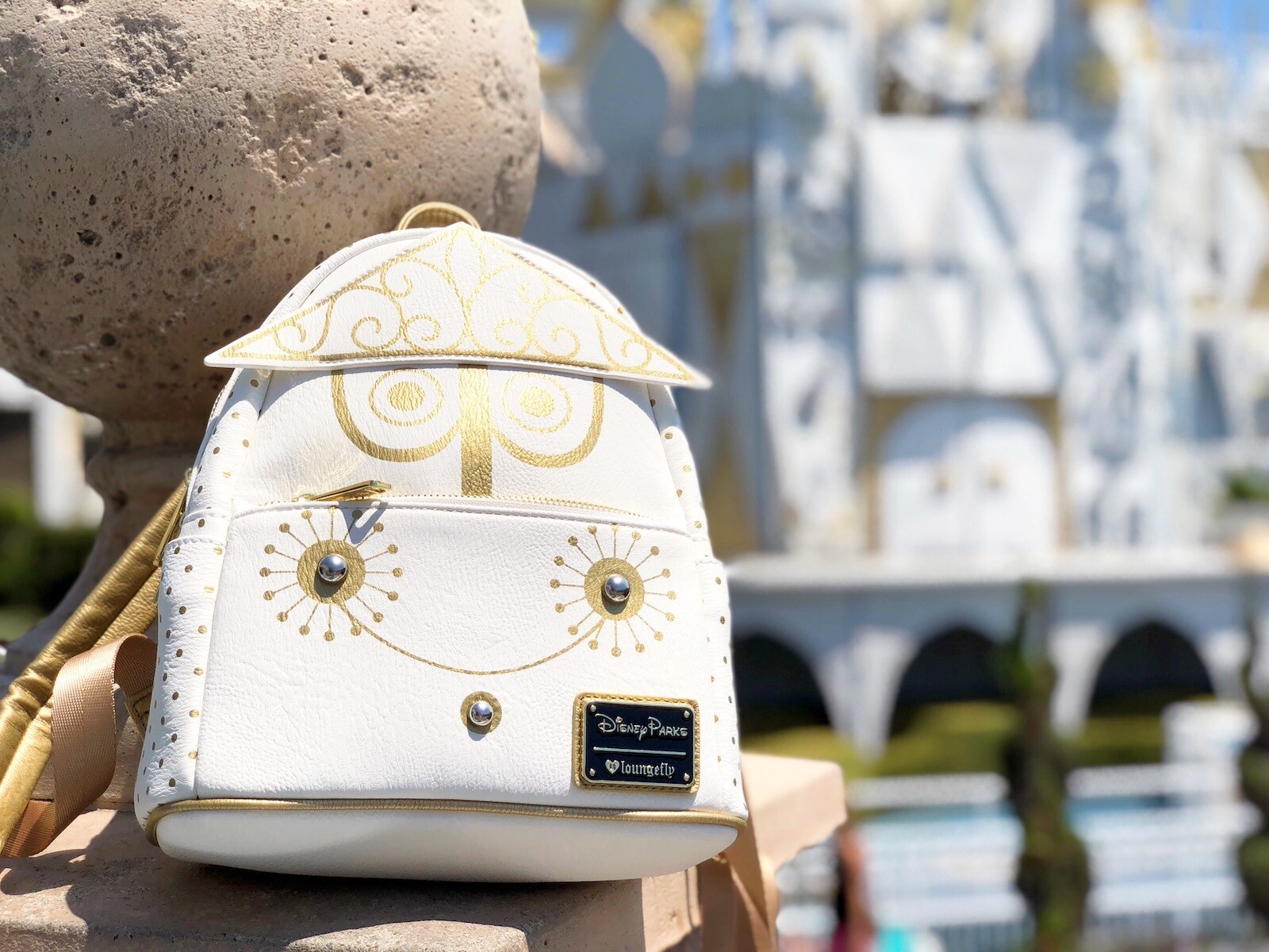 White and gold Disney Parks back pack