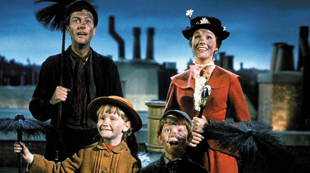 Bert, Mary Poppins and the children covered in soot.