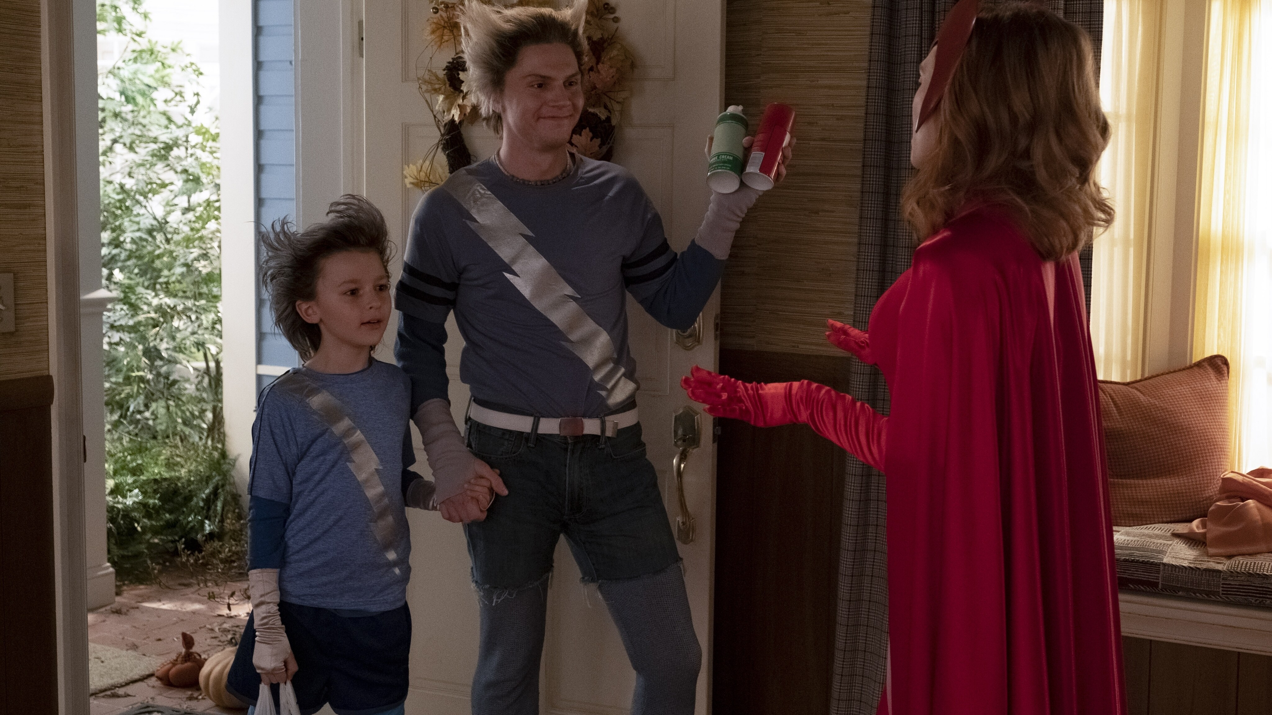 (L-R): Jett Klyne as Tommy, Evan Peters as Pietro and Elizabeth Olsen as Wanda Maximoff in Marvel Studios' WANDAVISION exclusively on Disney+. Photo by Chuck Zlotnick. ©Marvel Studios 2021. All Rights Reserved.