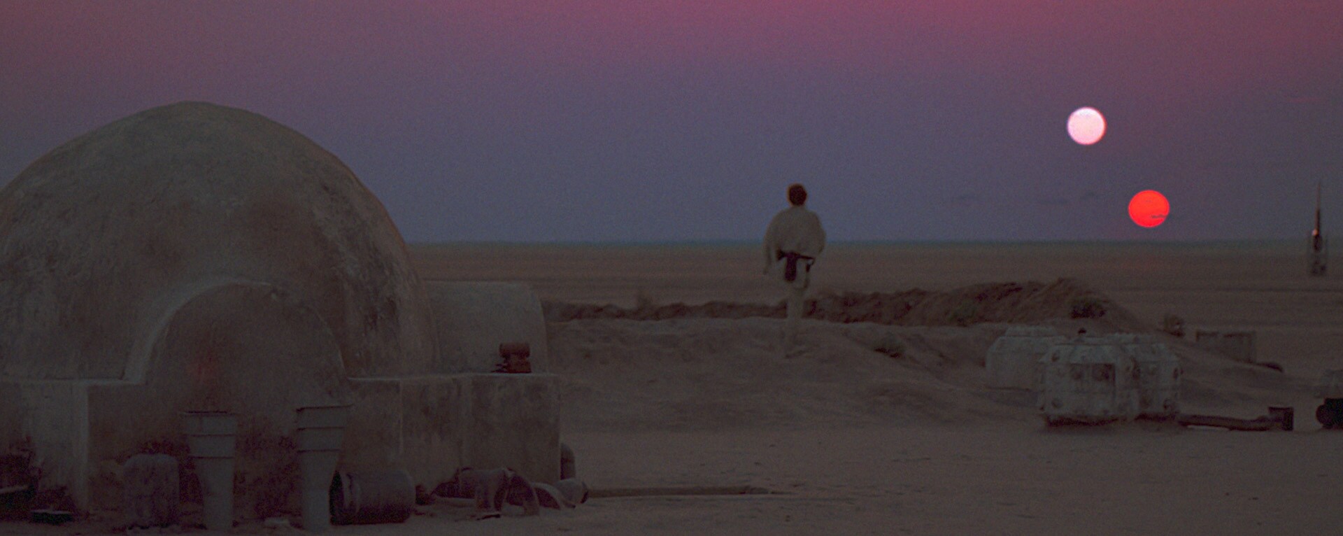 Luke looks out at the twin suns on Tatooine.