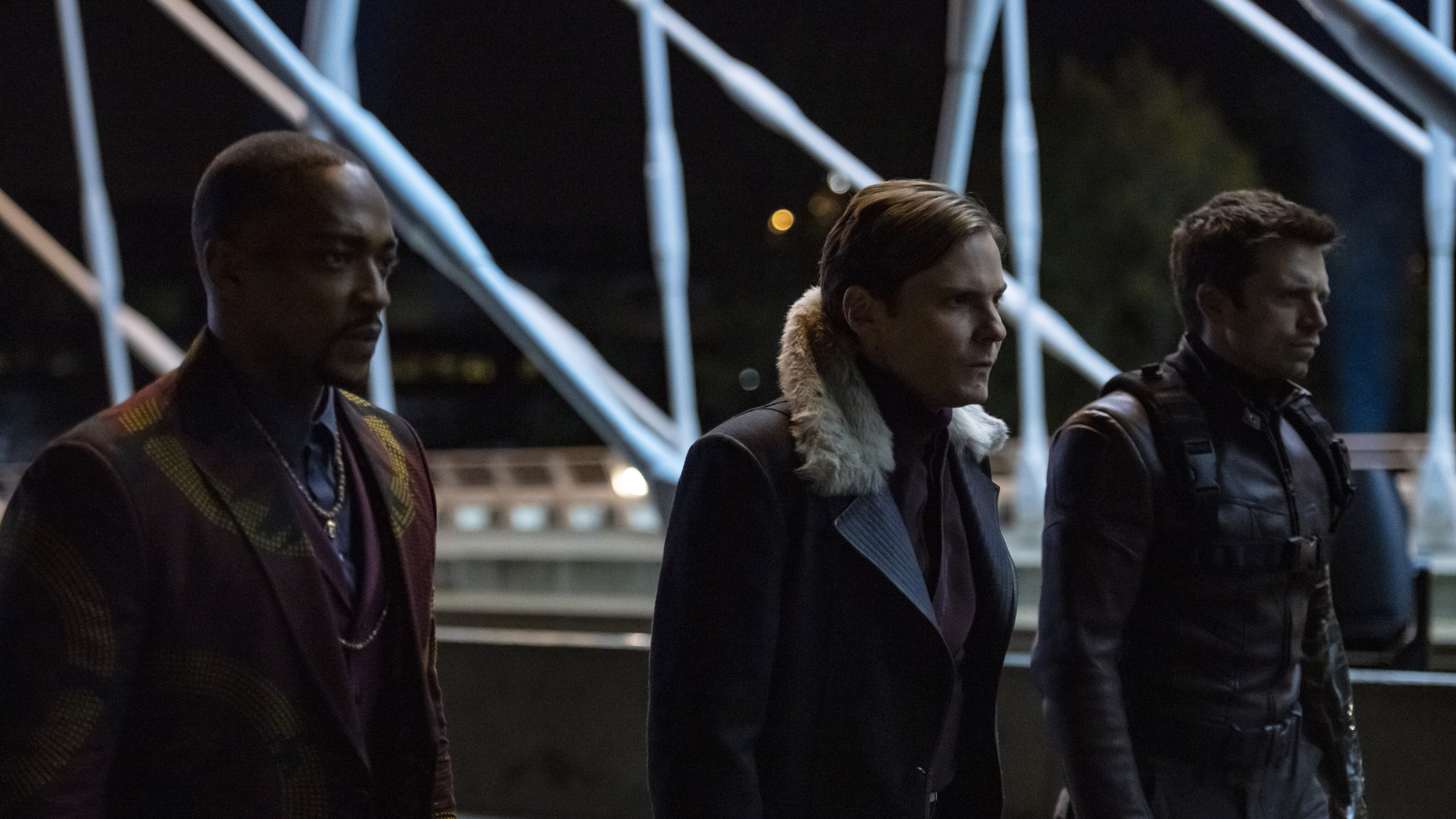 (L-R): Falcon/Sam Wilson (Anthony Mackie), Zemo (Daniel Brühl) and Winter Soldier/Bucky Barnes (Sebastian Stan) in Marvel Studios' THE FALCON AND THE WINTER SOLDIER exclusively on Disney+. Photo by Julie Vrabelová. ©Marvel Studios 2021. All Rights Reserved.