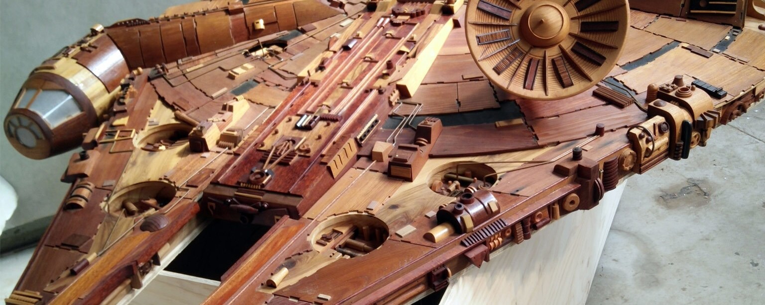 A close-up of the top of the wooden Millennium Falcon sculpture.