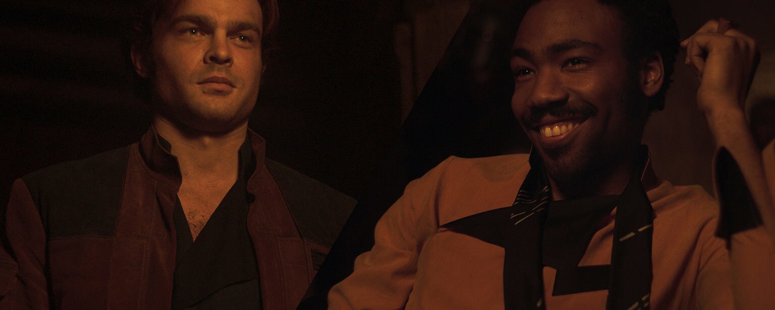 A split image shows young Han Solo, on the left, and young Lando Calrissian, on the right.