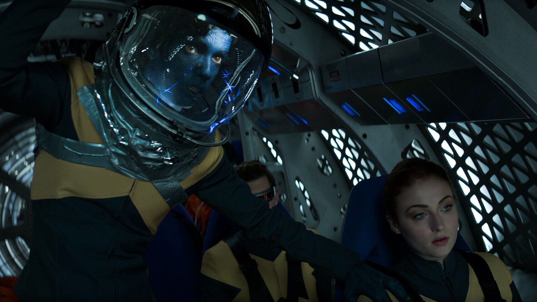 Actor Sophie Turner (as Jean Grey/Phoenix), Kodi Smit-McPhee (as Kurt Wagner/Nightcrawler and Tye Sheridan (Scott Summers/Cyclops) in a spacecraft in the movie "X-Men: Dark Phoenix"