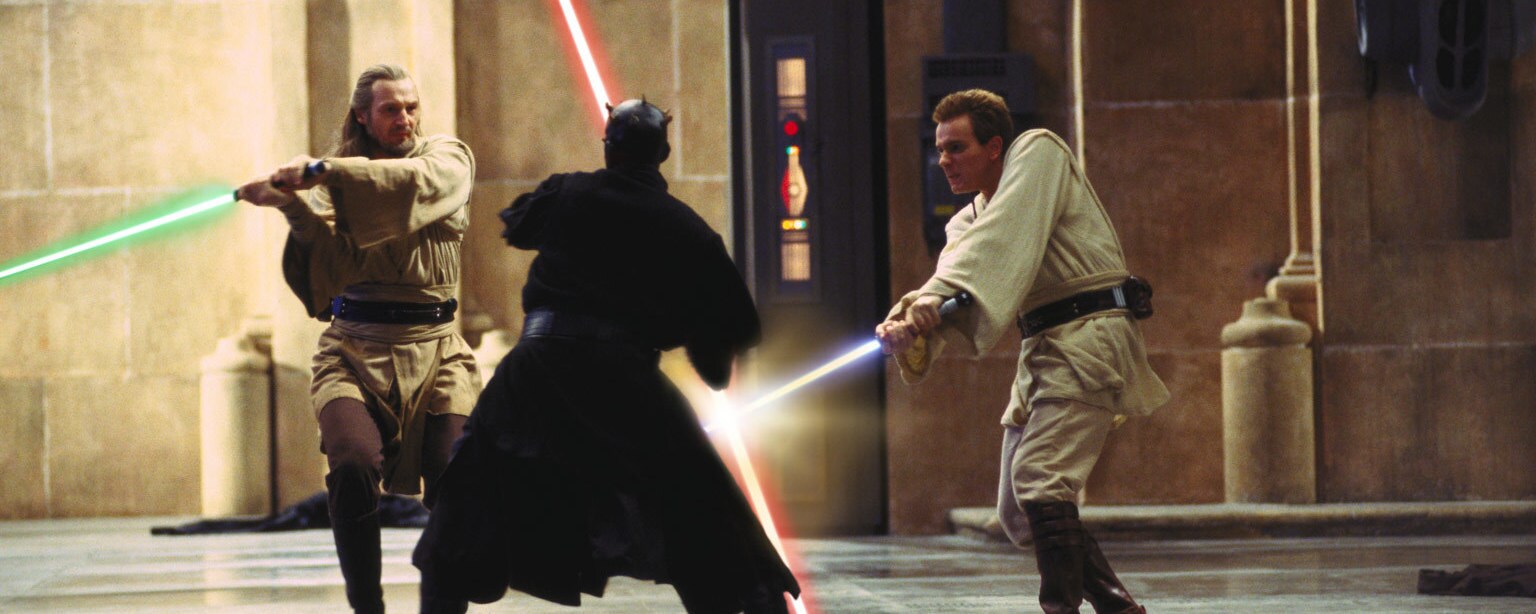 Qui-Gon, Obi-Wan, and Darth Maul duel in The Phantom Menace.