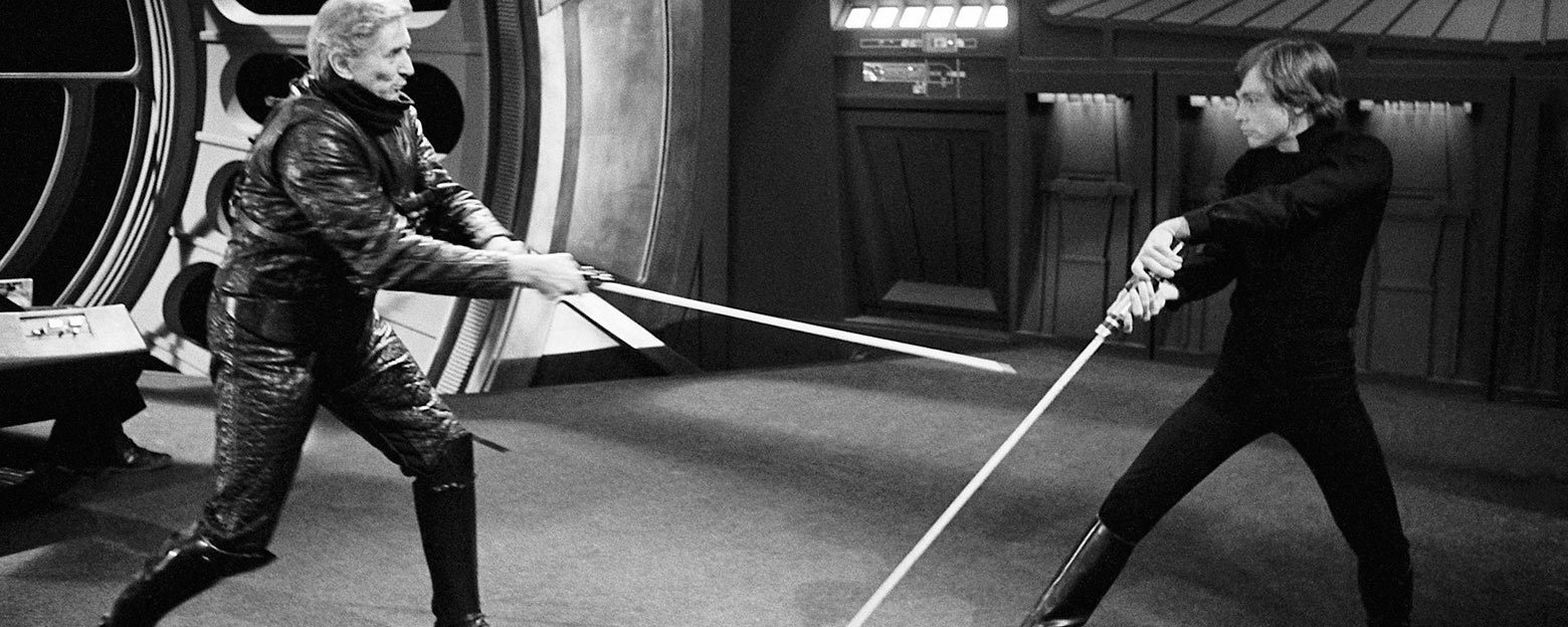 Olympic fencer Bob Anderson rehearses a duel with Mark Hamill, on the set of Return of the Jedi.