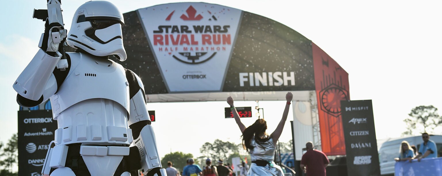 A stormtrooper stands by the runDisney Star Wars Rival Run finish line