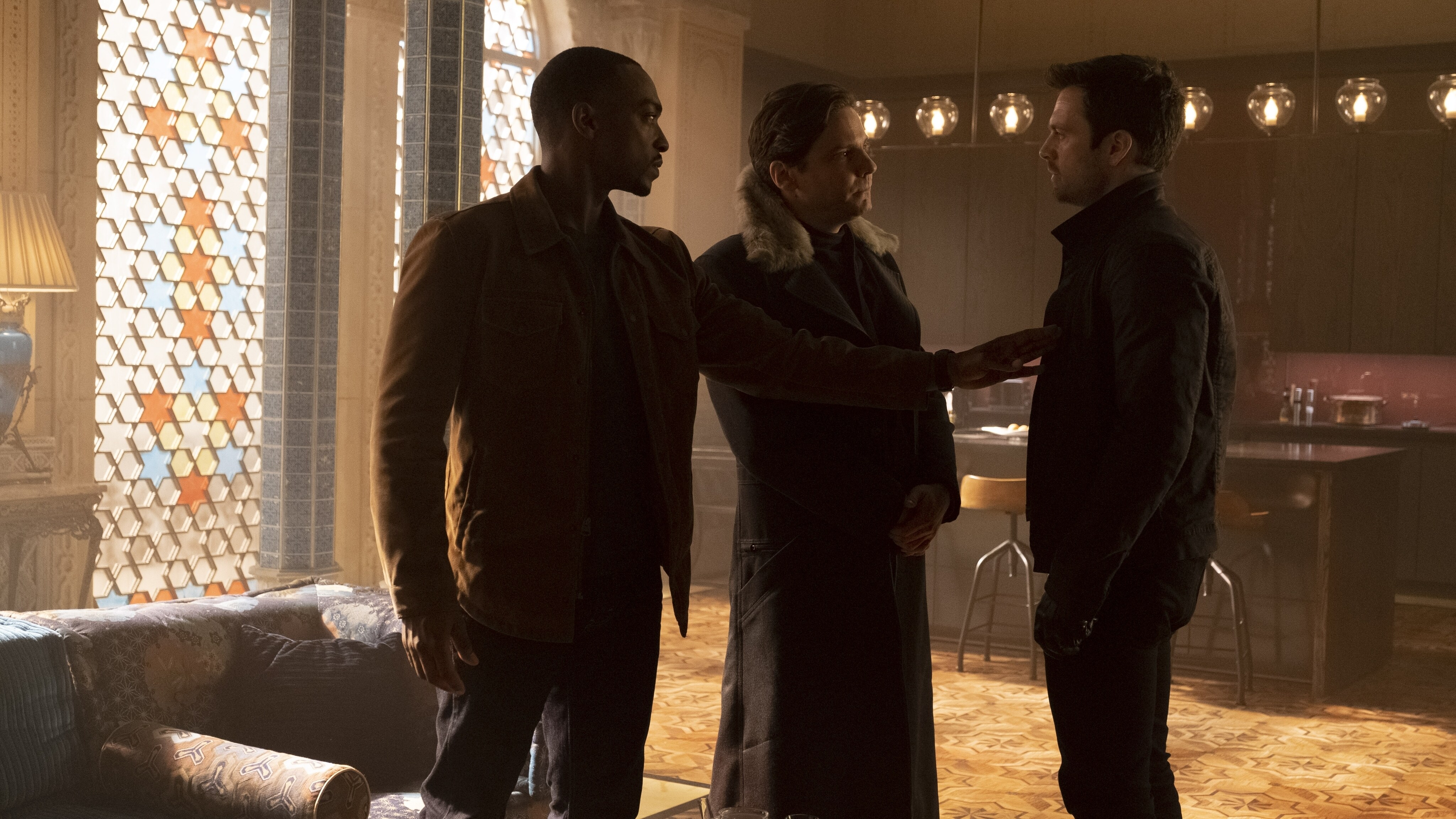 (L-R): Falcon/Sam Wilson (Anthony Mackie), Zemo (Daniel Brühl) and Winter Soldier/Bucky Barnes (Sebastian Stan) in Marvel Studios' THE FALCON AND THE WINTER SOLDIER exclusively on Disney+. Photo by Chuck Zlotnick. ©Marvel Studios 2021. All Rights Reserved.