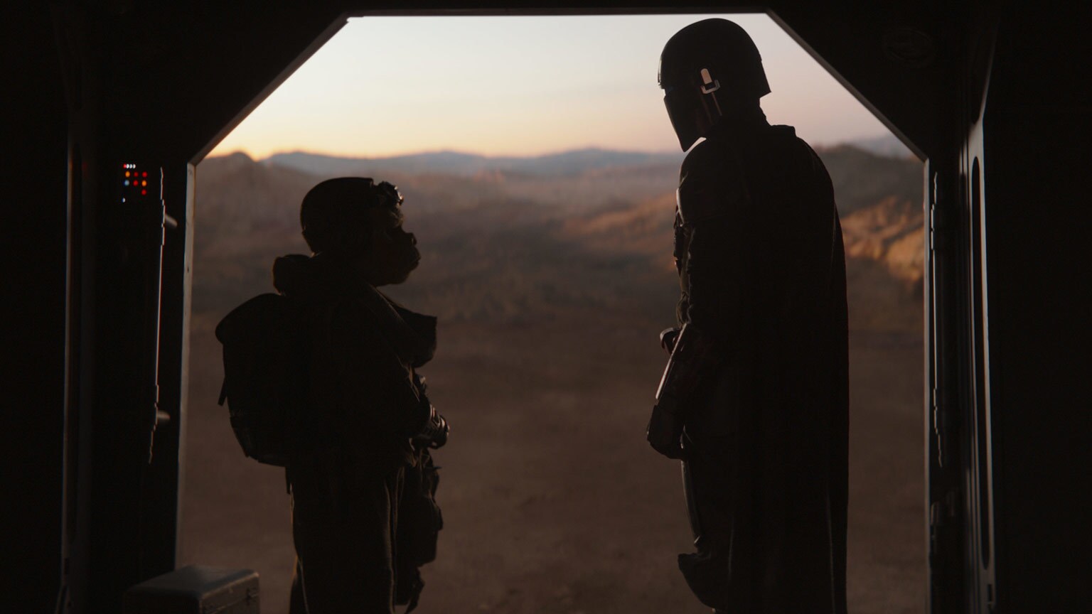 Din Djarin and Grogu on Arvala-7 near the Razor Crest after their first encounter