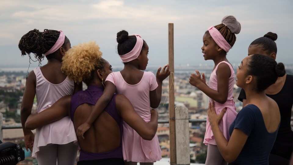 Transgender girl in Brasil watching the other girls dance.…