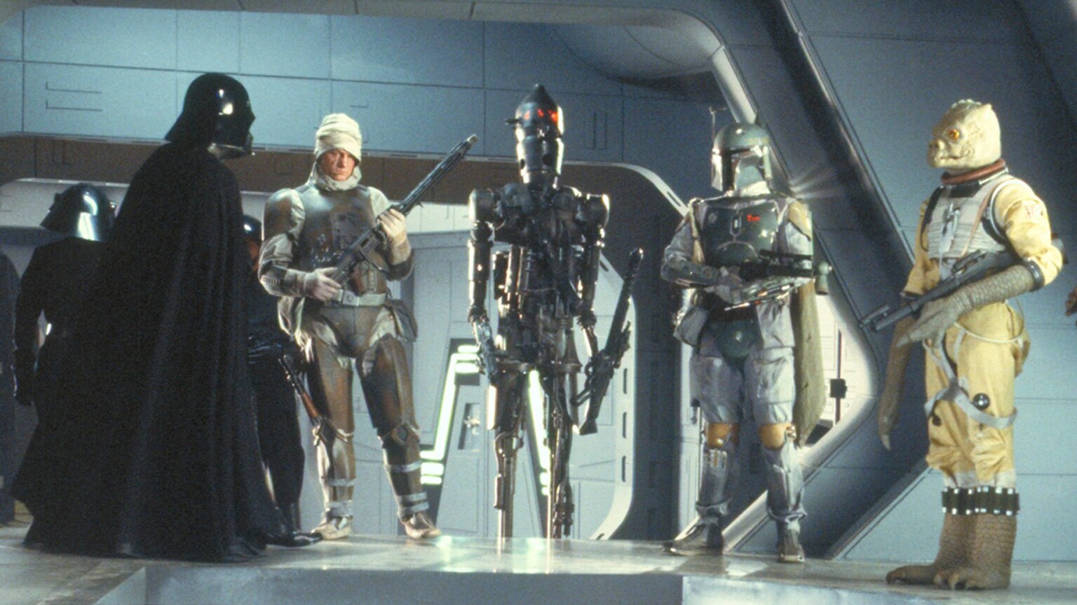 Bounty Hunters line up with Darth Vader.