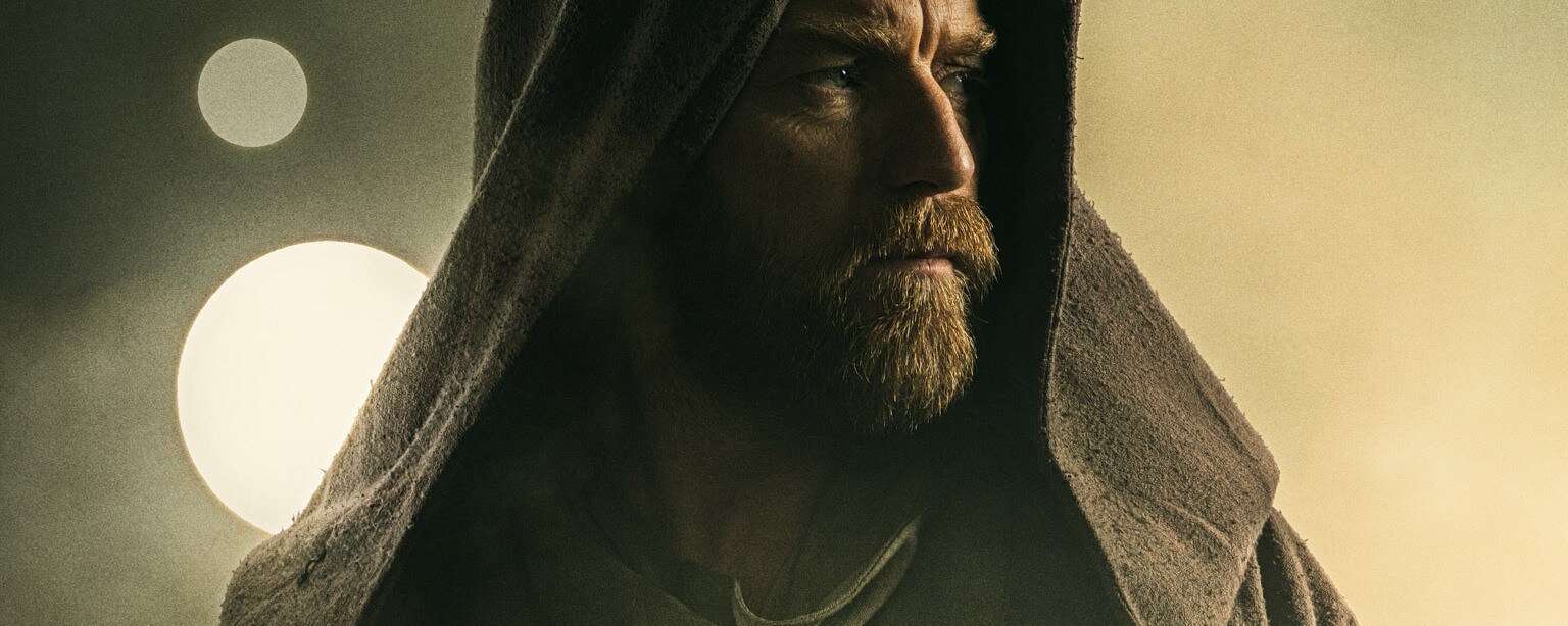 Obi-Wan Kenobi in a hooded cape.